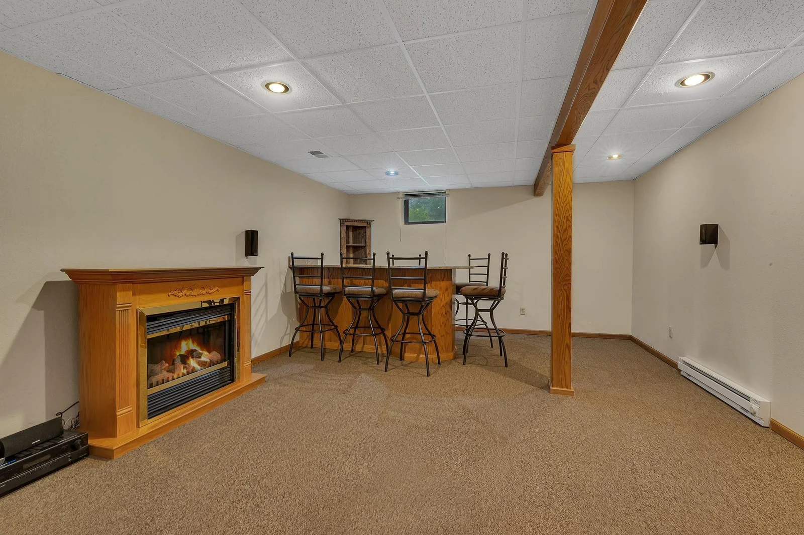 Lower level family room + bar with granite countertop