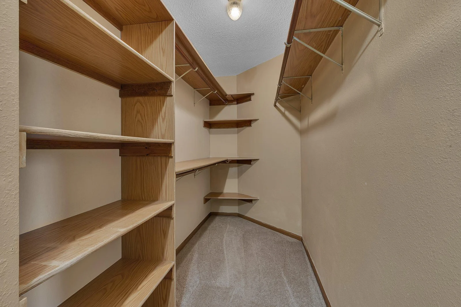 Spacious primary walk-in closet