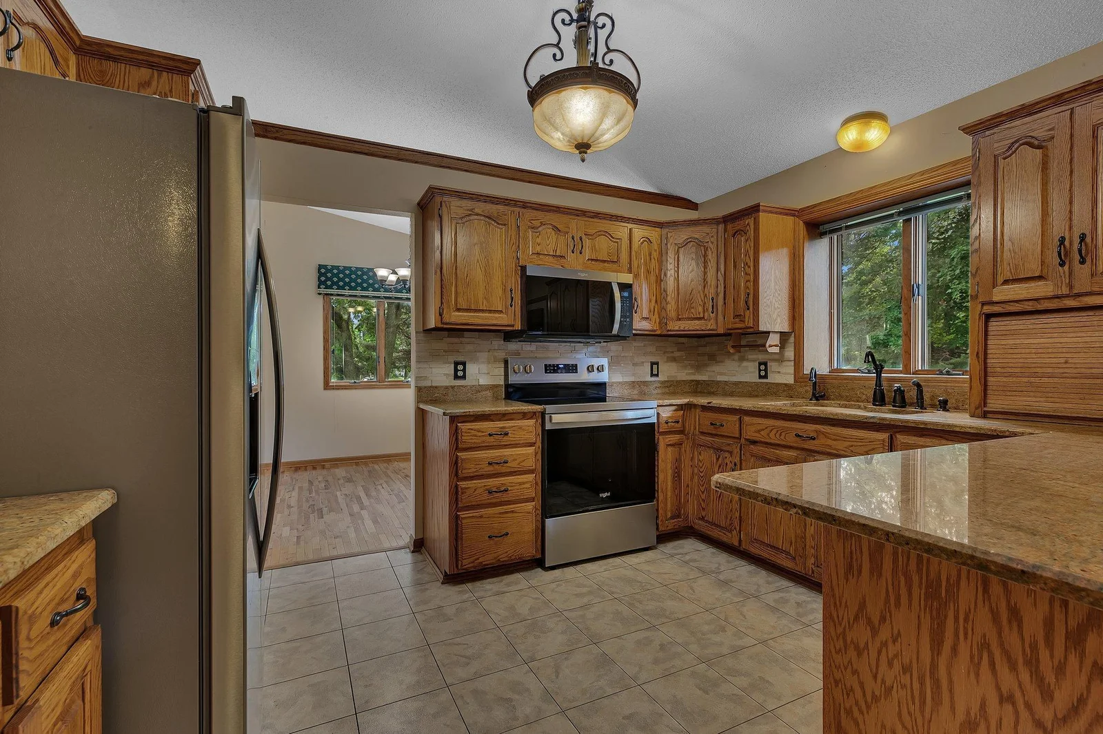 Granite counters with SS appliances + appliance garage