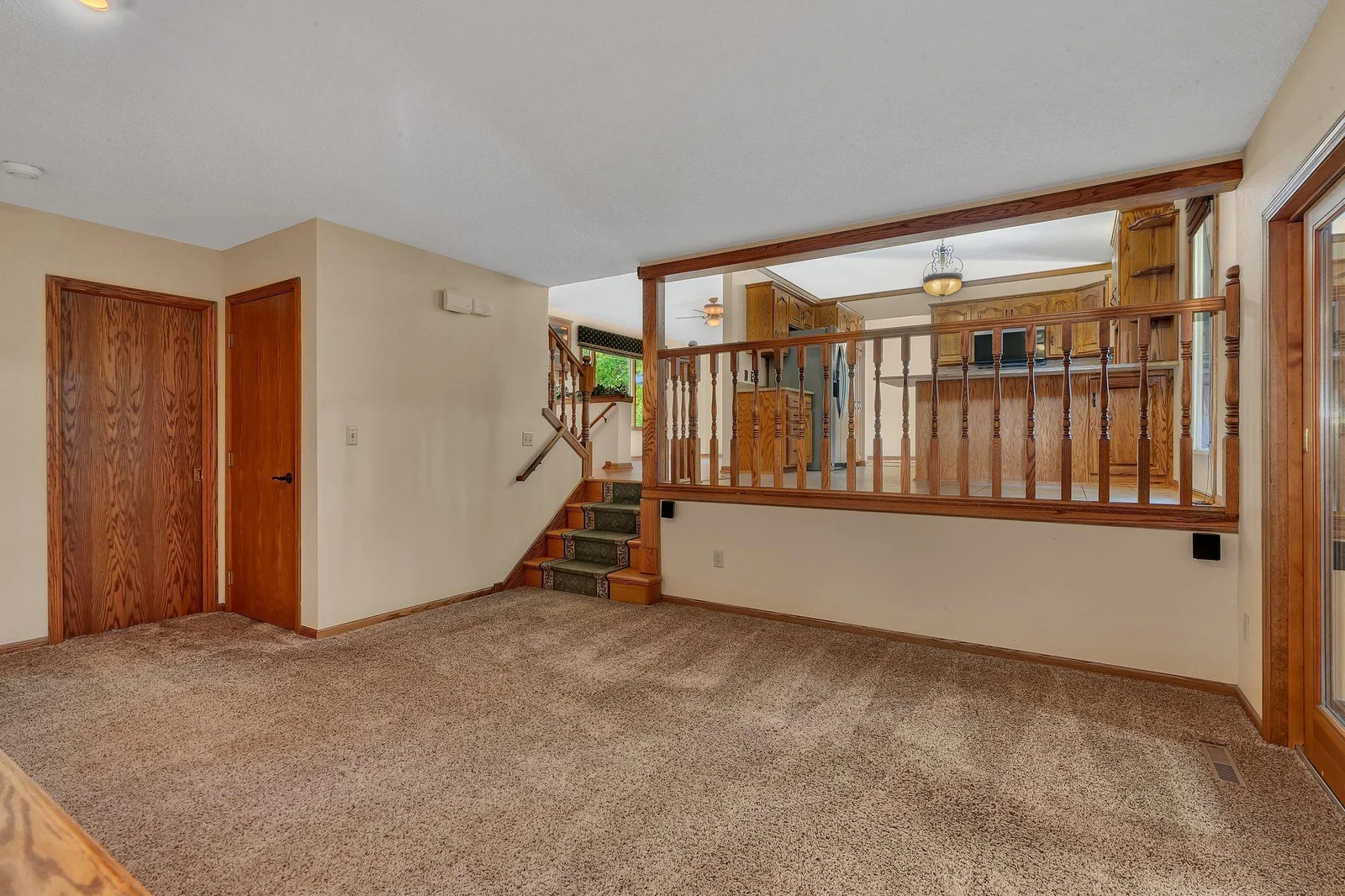 Another view of the additional living space. Doors on left lead to the office and lower level