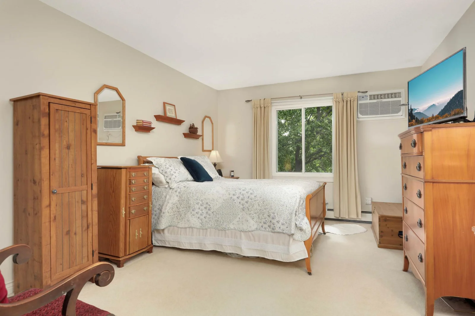 Primary bedroom with lake views.