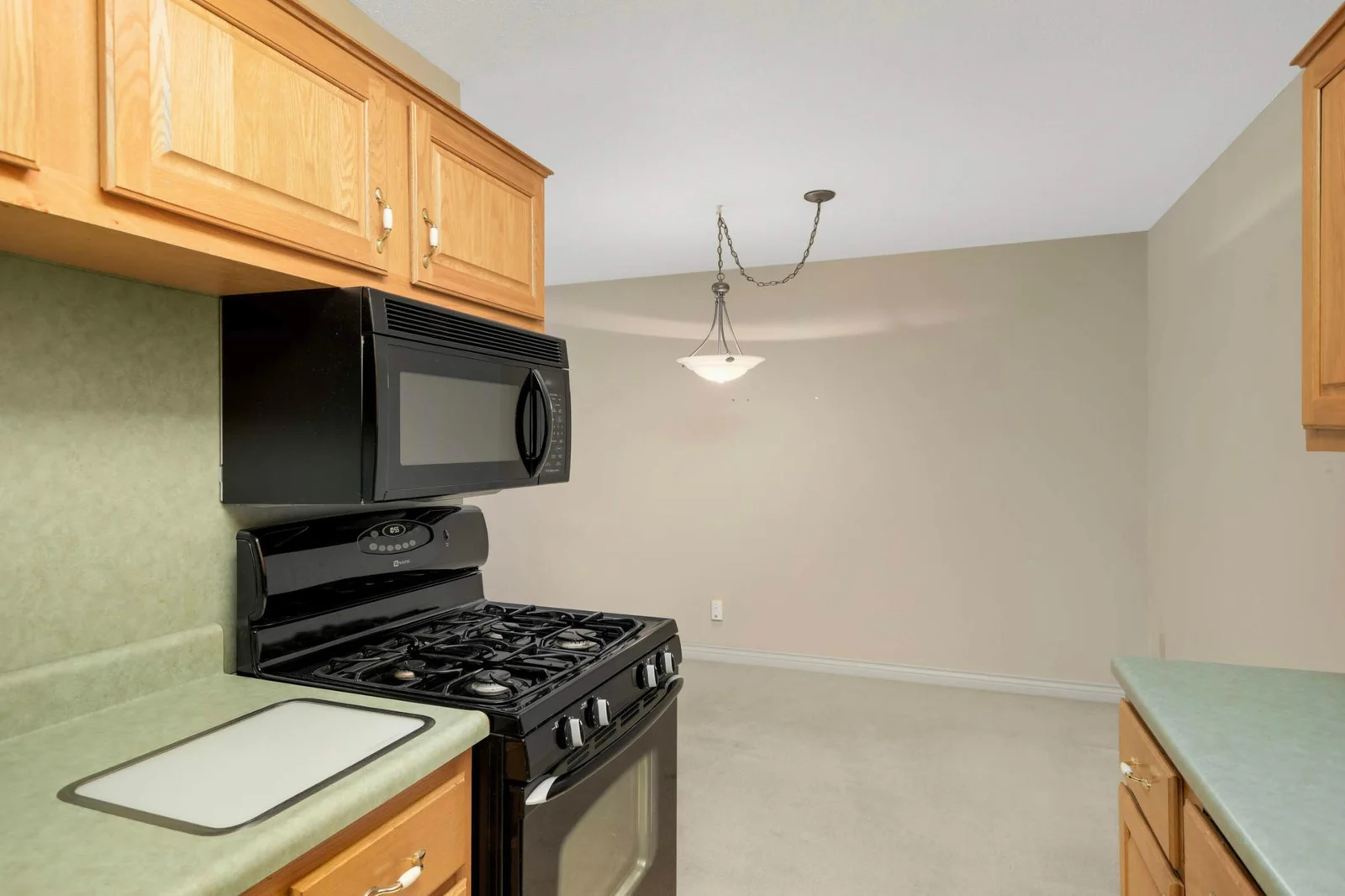 Kitchen opens to dining area.