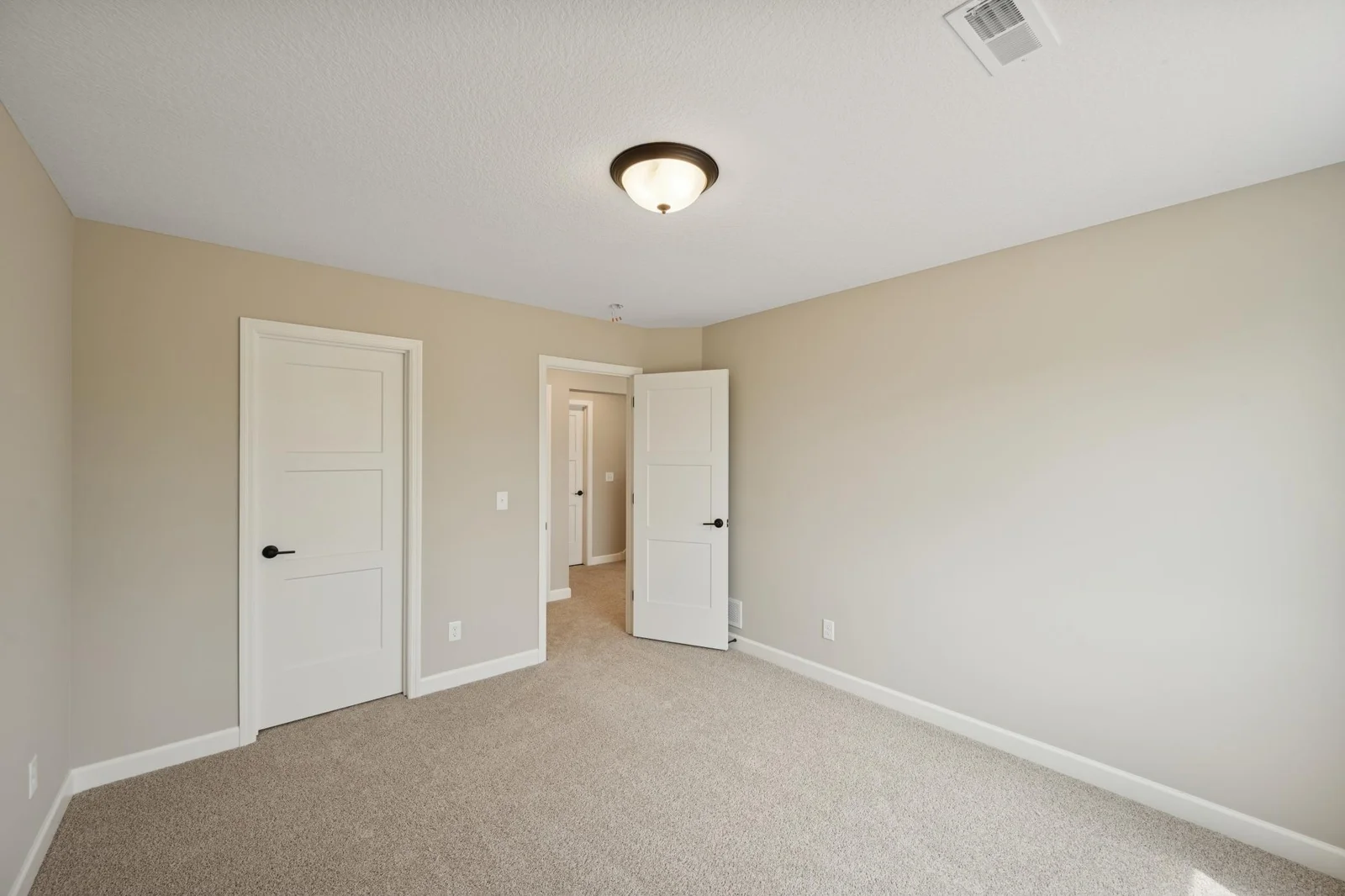 49. Lower level bedroom