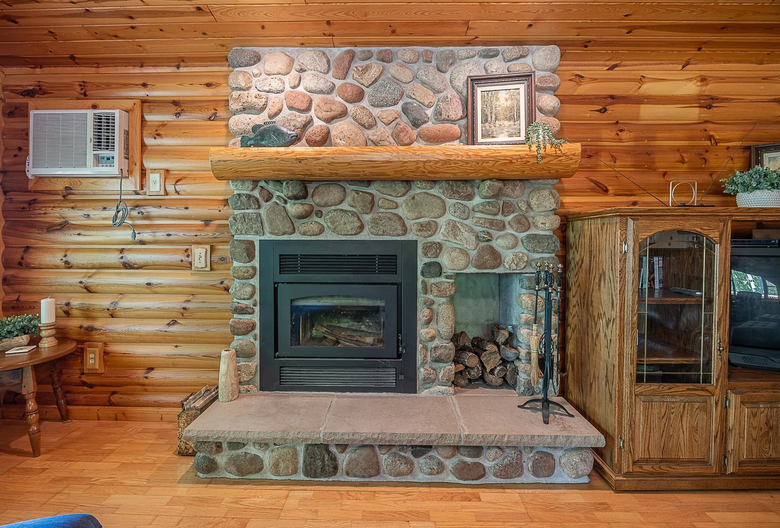 Hand stacked stone fireplace.