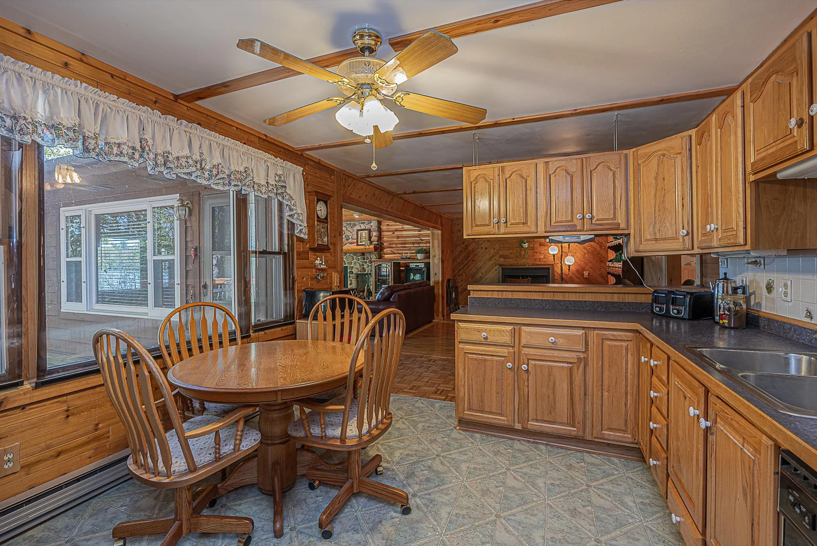 Eat-in kitchen with additional dining room.