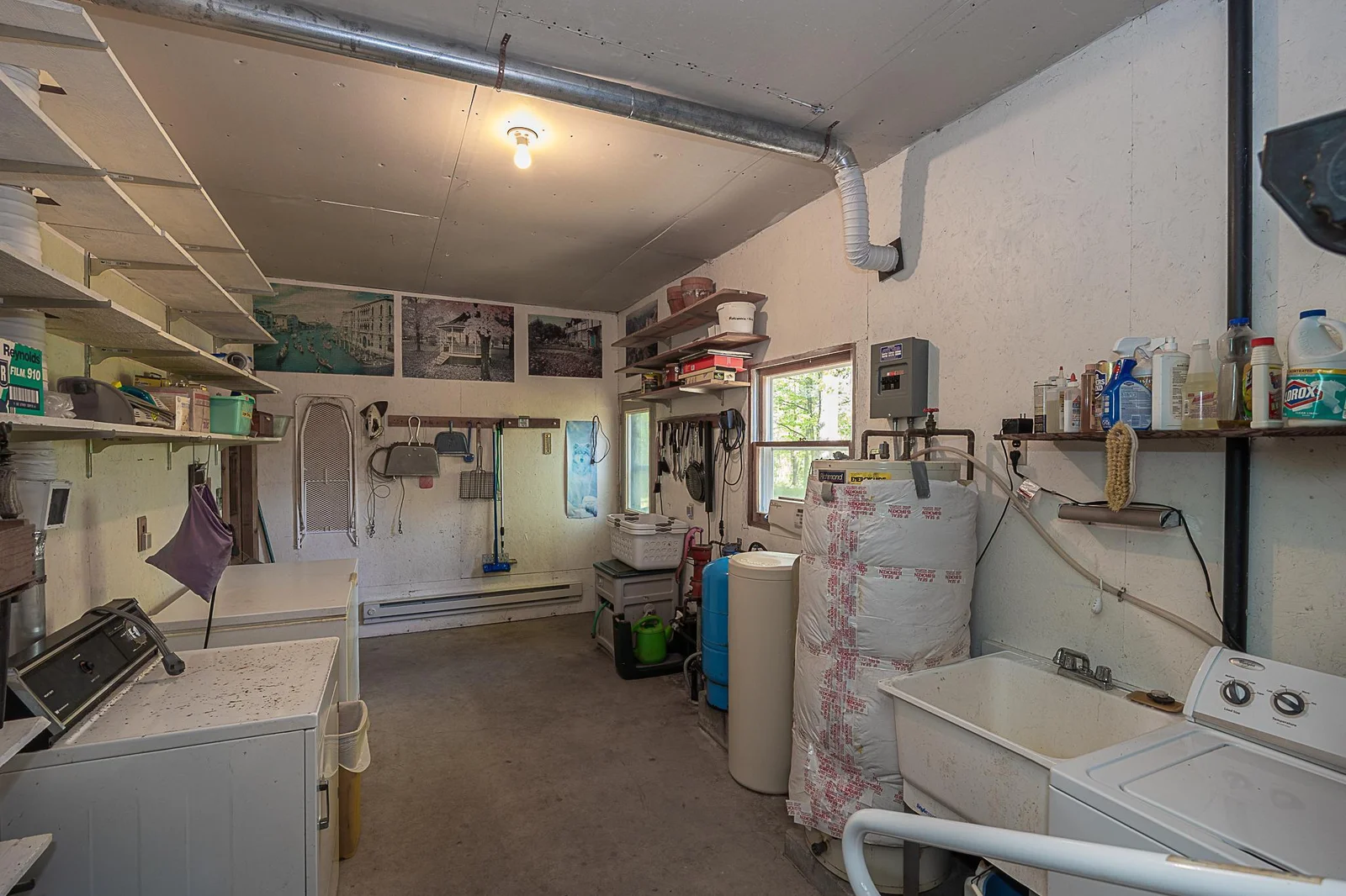 Large utility room with washer and dryer.