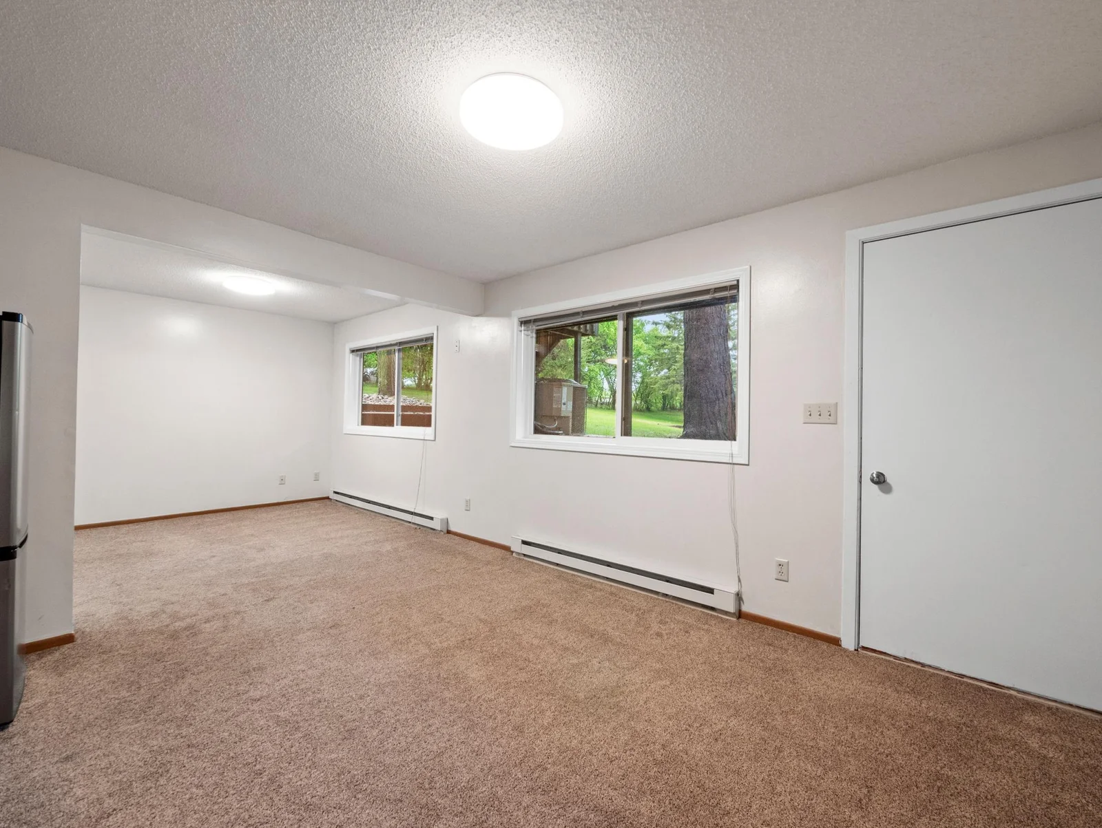 Lookout windows ensure this lower level is bright and welcoming.