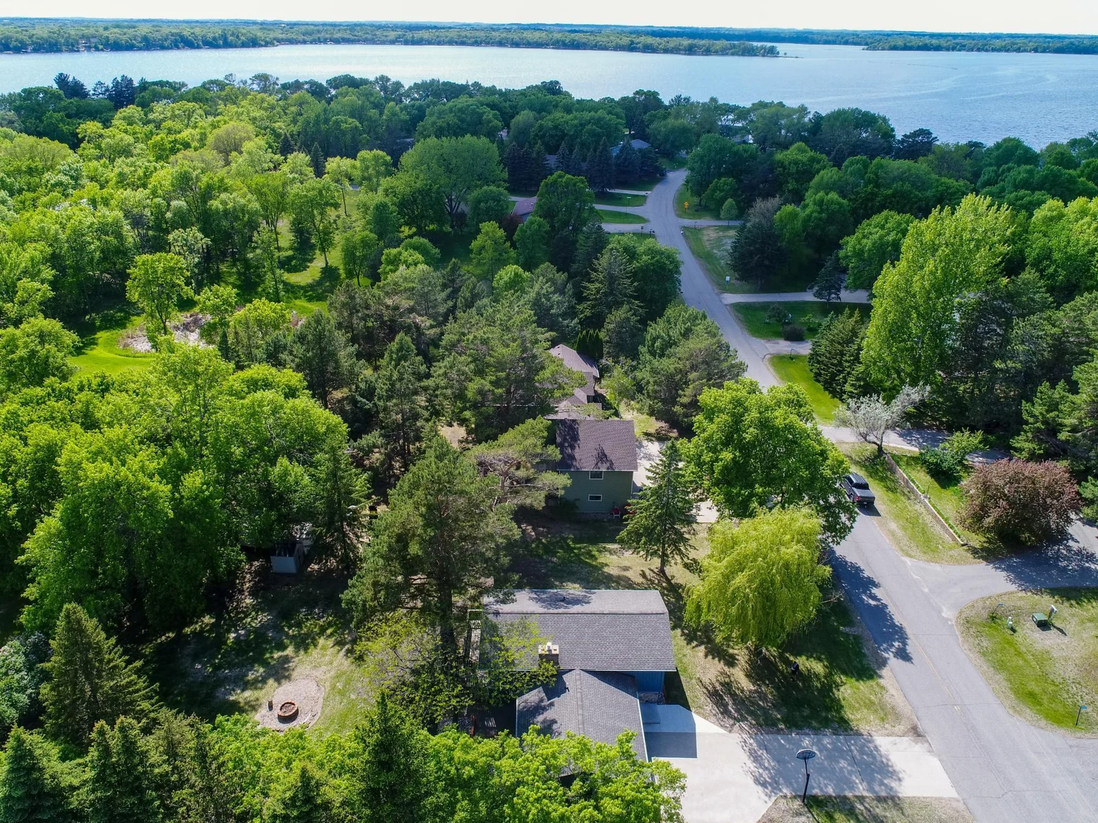 Enjoy shared access to Lake Le Homme Dieu and its slip to the Alexandria Chain of Lakes.