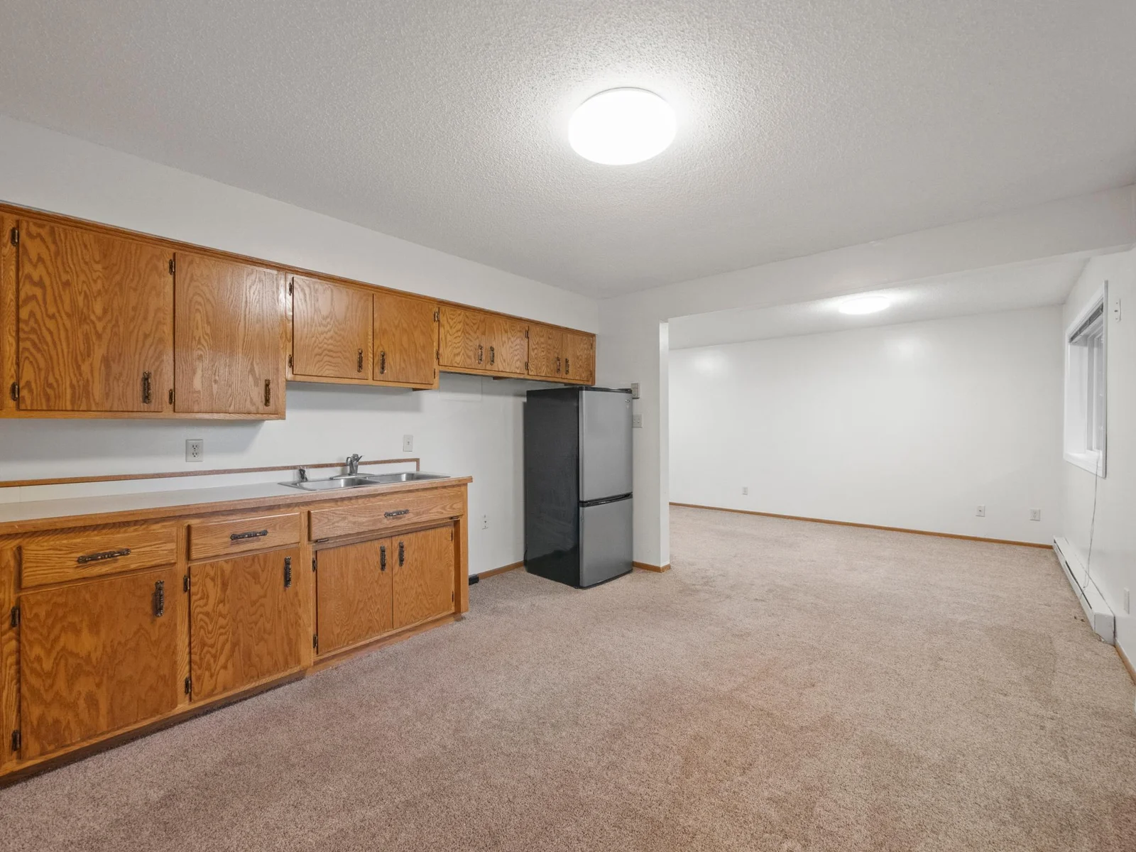 From cozy movie nights with family to lively gatherings with friends, this family room is perfect for every occasion.
