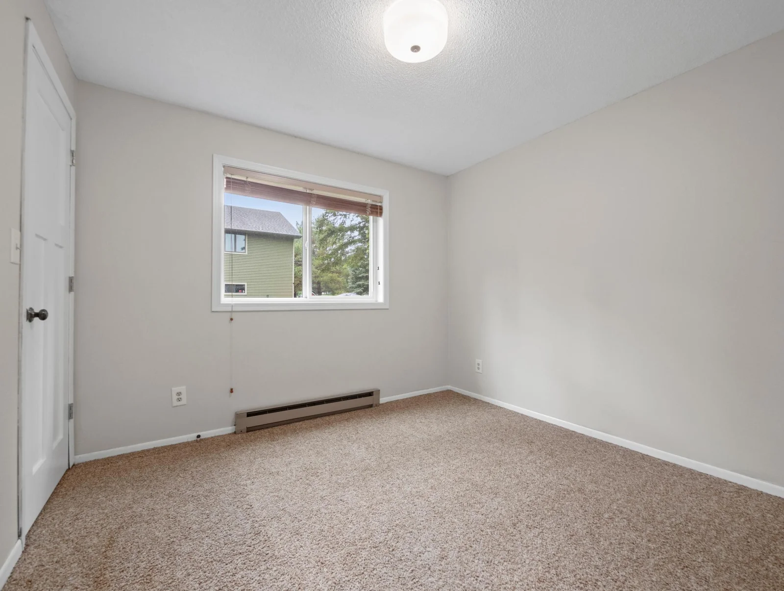 This flexible space is ready to suit your needs whether it's a guest bedroom, home office, gym, or more!
