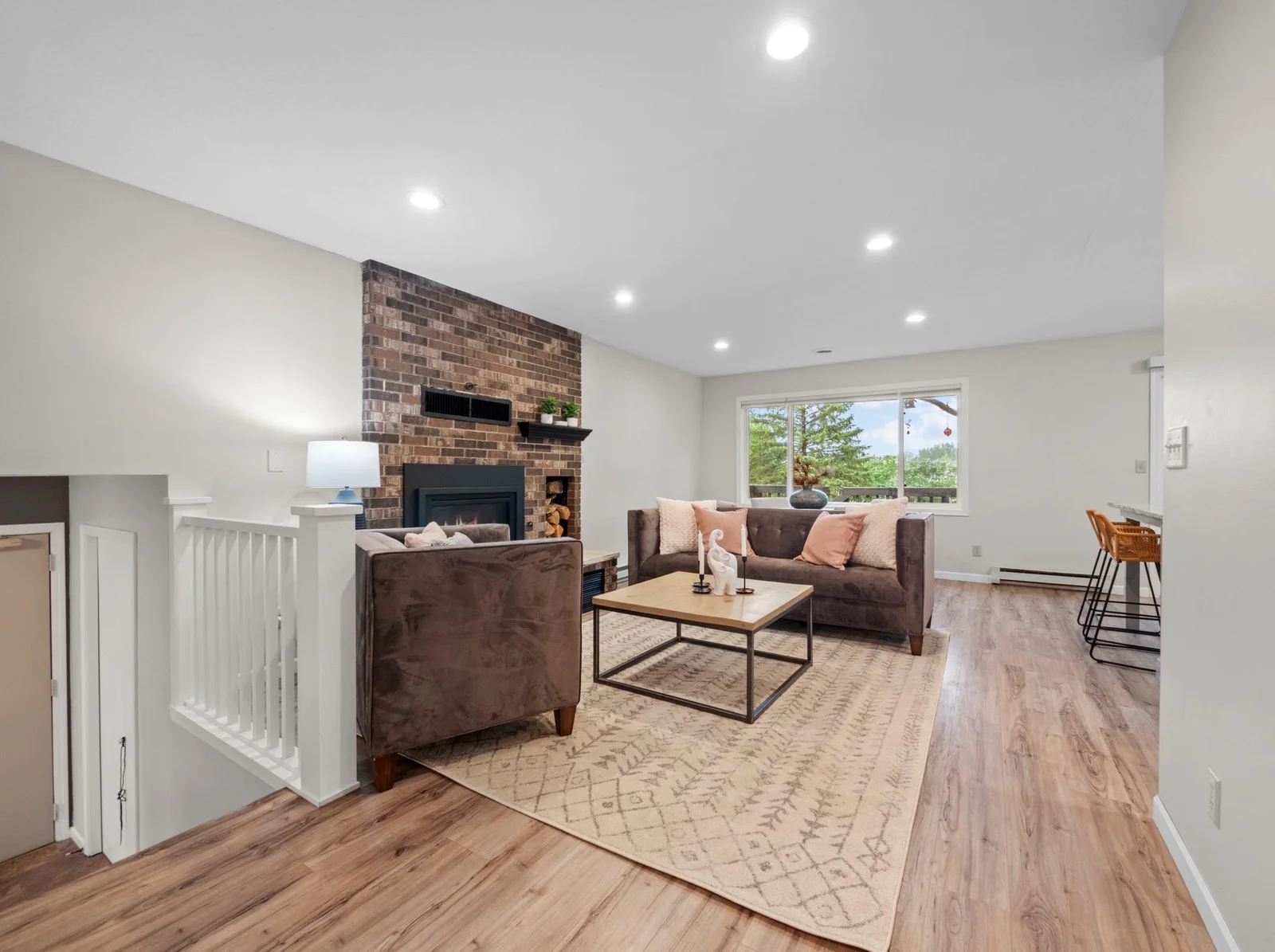 The impressive style of this home begins with gleaming hard surface floors, neutral tones, and abundant natural light.