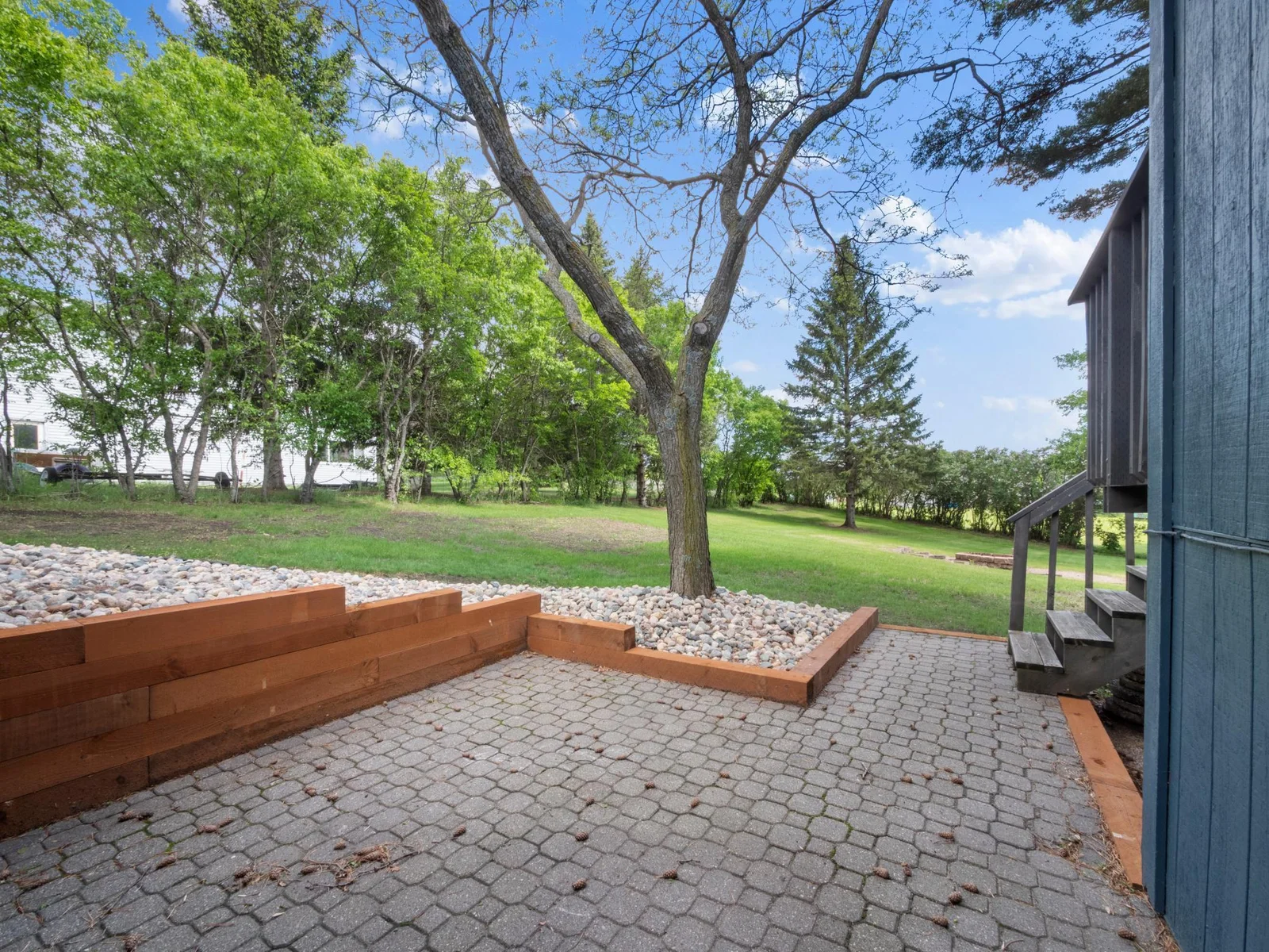 Refreshed landscaping enhances curb appeal and outdoor enjoyment.