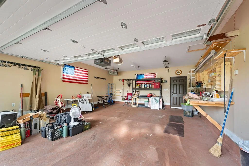 Heated Garage with service door to backyard as well as entry to breezeway!