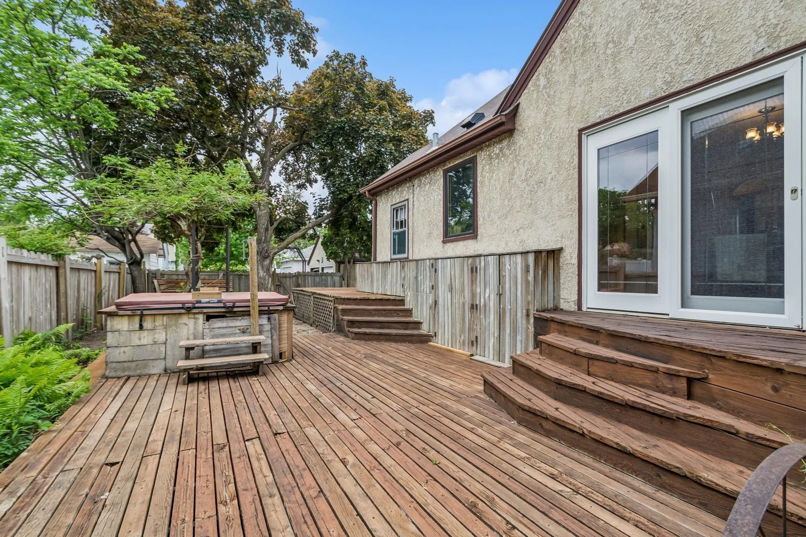 This side-yard has so much space for entertaining. Hot tub? Well if yes.....wonderful! If no - it can be removed before you move in