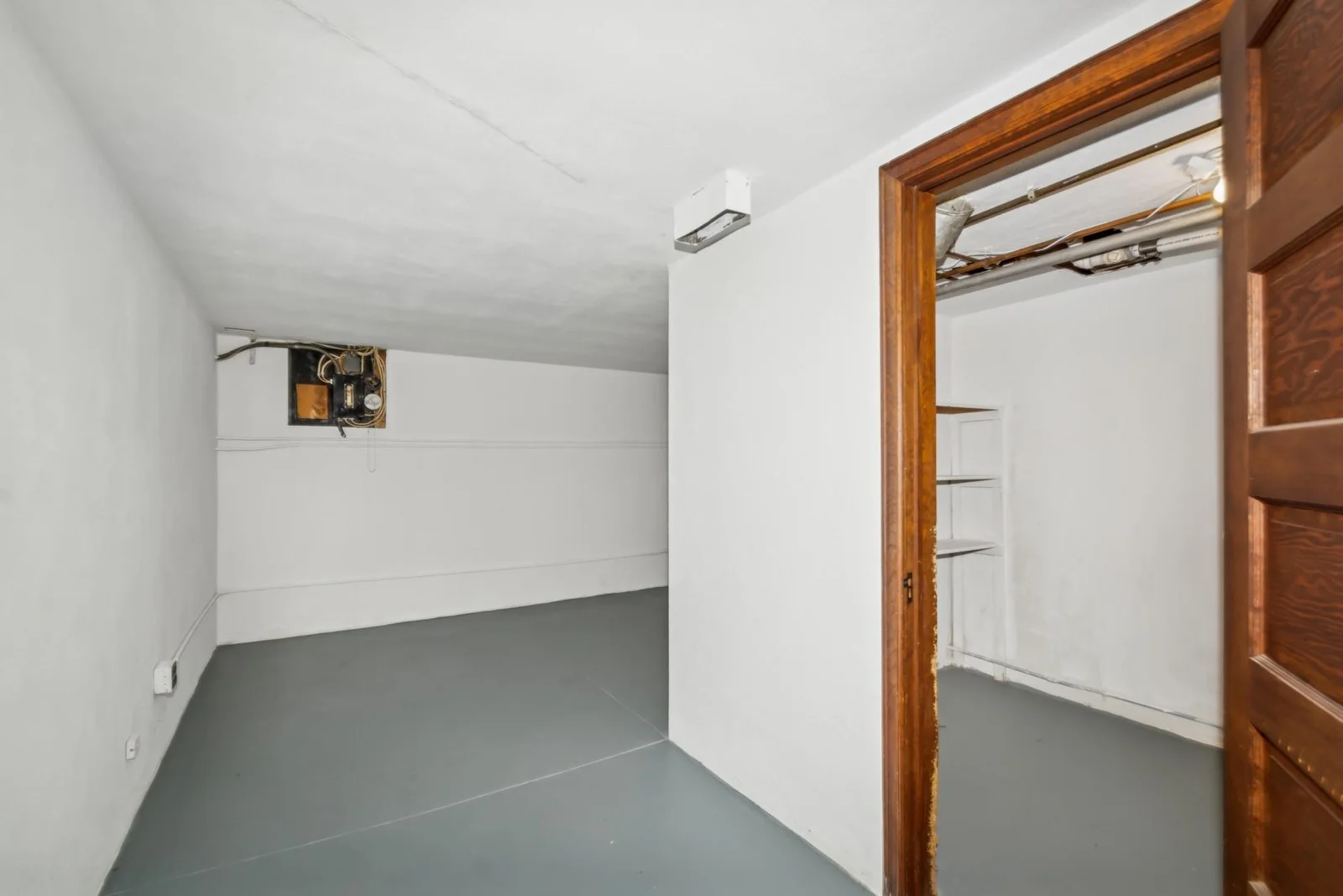 Basement is so clean! finishing potential. Also already has some storage already set up
