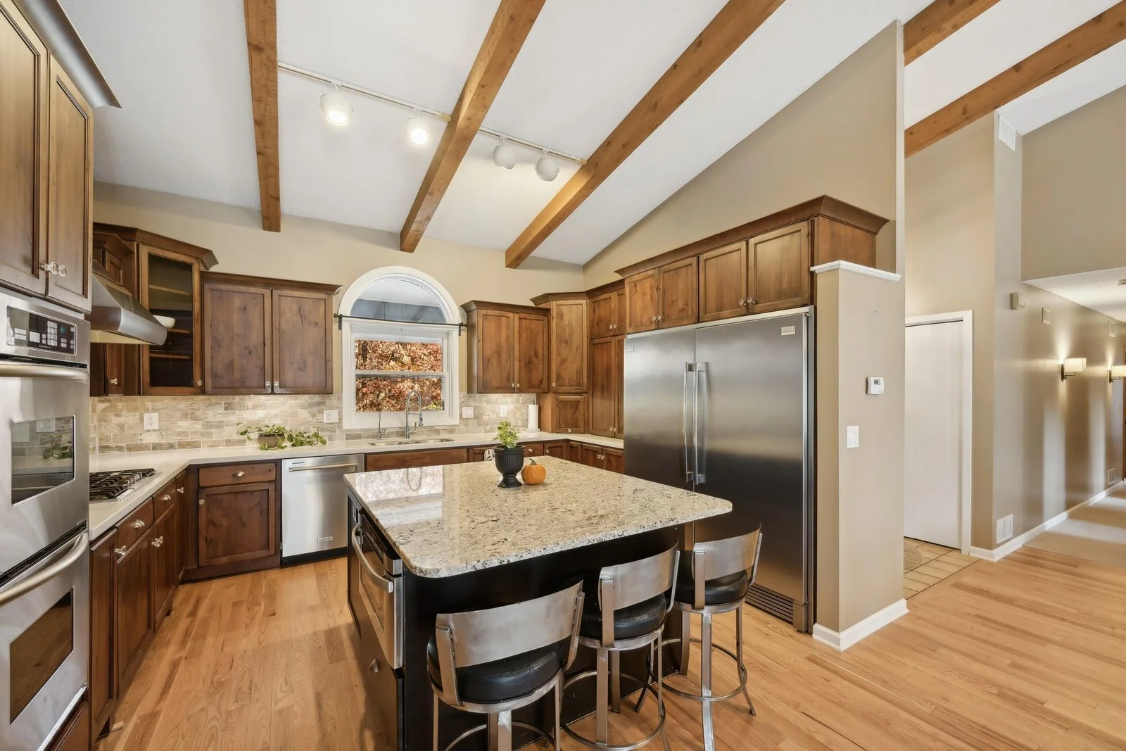 updated kitchen with new hardwood floors