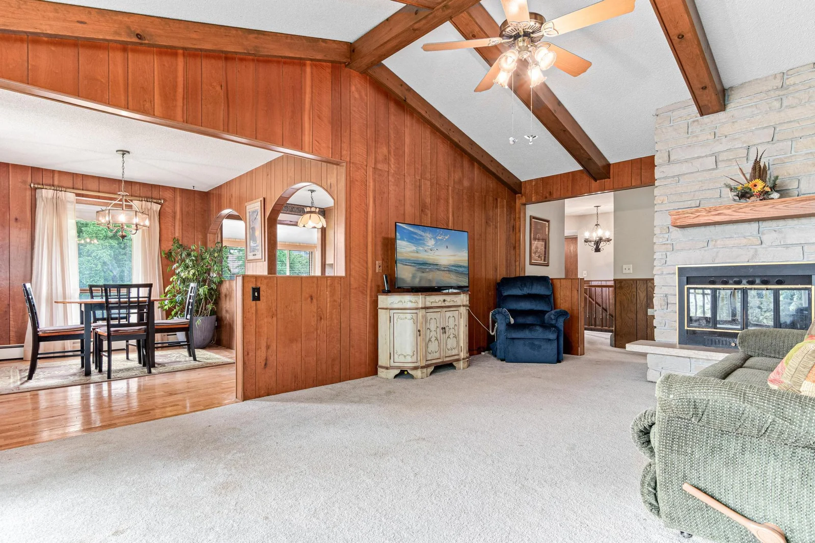 An early version of open-concept living is found amongst the community living areas with large openings to adjoin the rooms, but enough structure to still create well defined spaces.