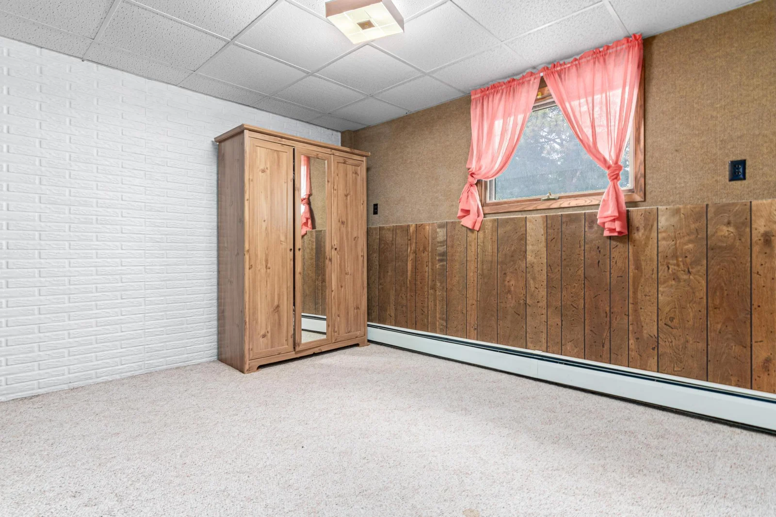 Bedroom 2 of 2 on the lower level.  This room has a nice sized closet with ample shleving.