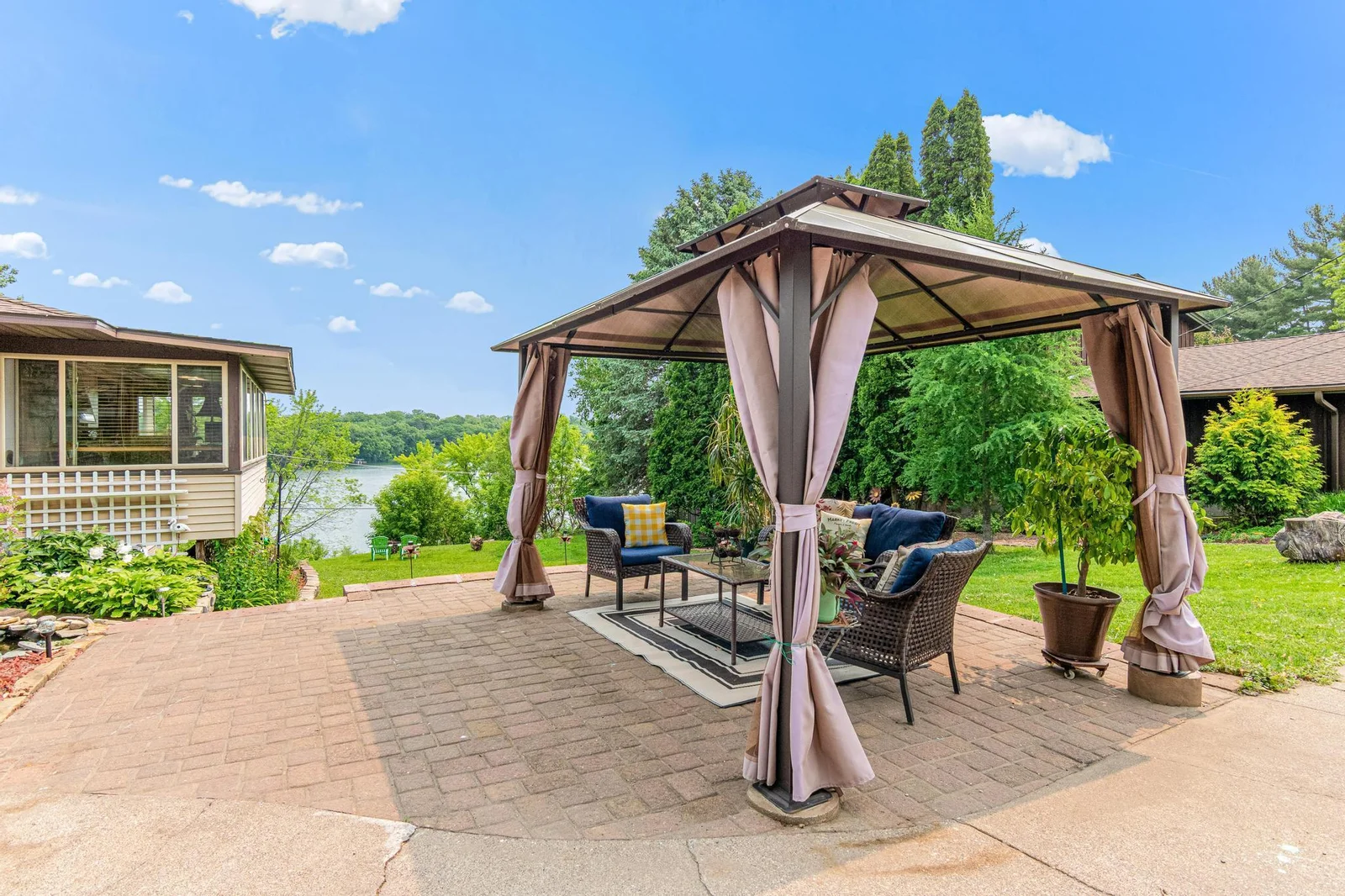 This large paver patio looks out to the lake.