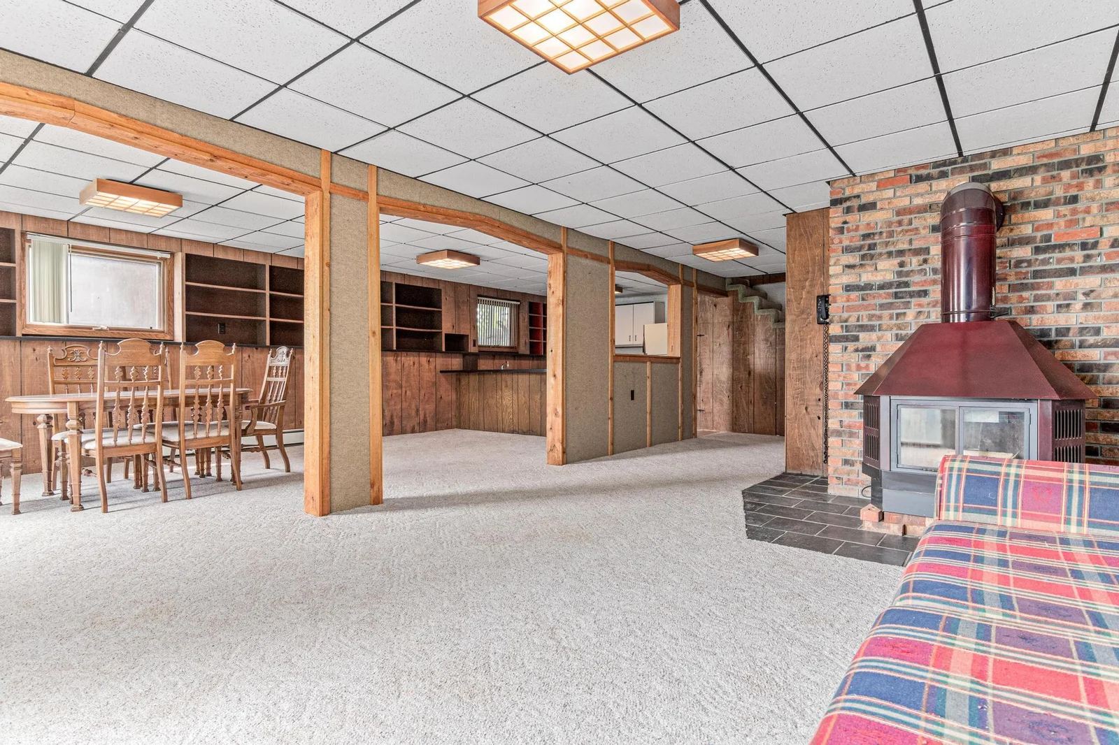 The lower level family room and kitchen are all one large space which is excellent for entertaining a crowd.