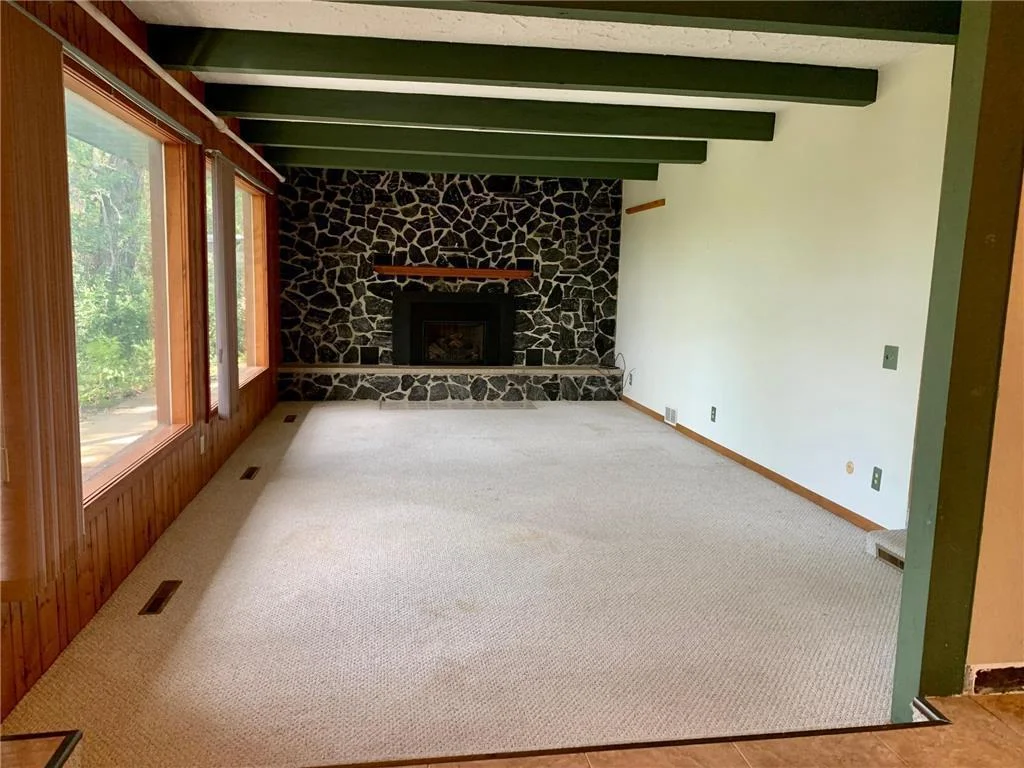 Main Floor Living room w/ Fireplace