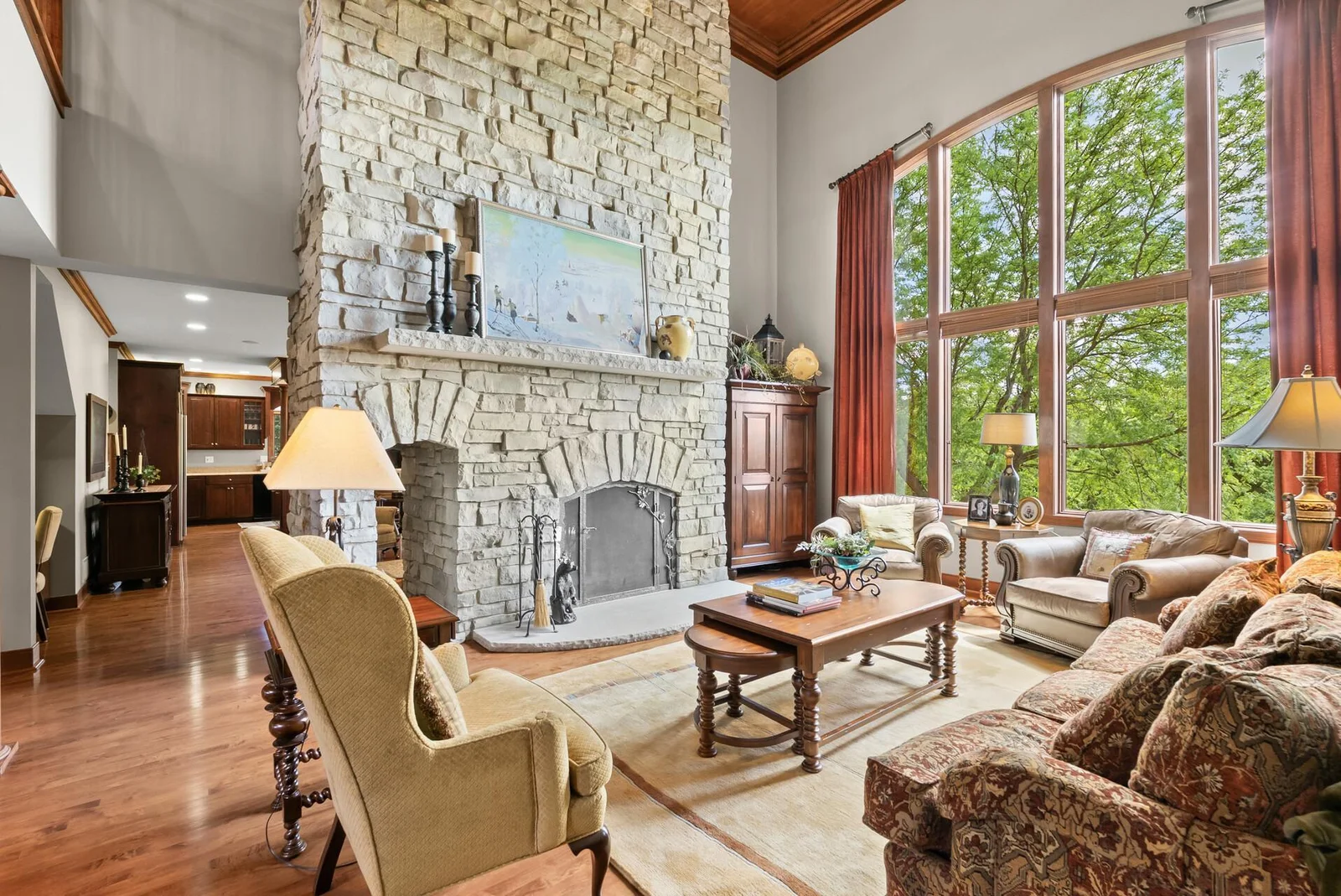 Majestic 2 story windows and stone fireplace