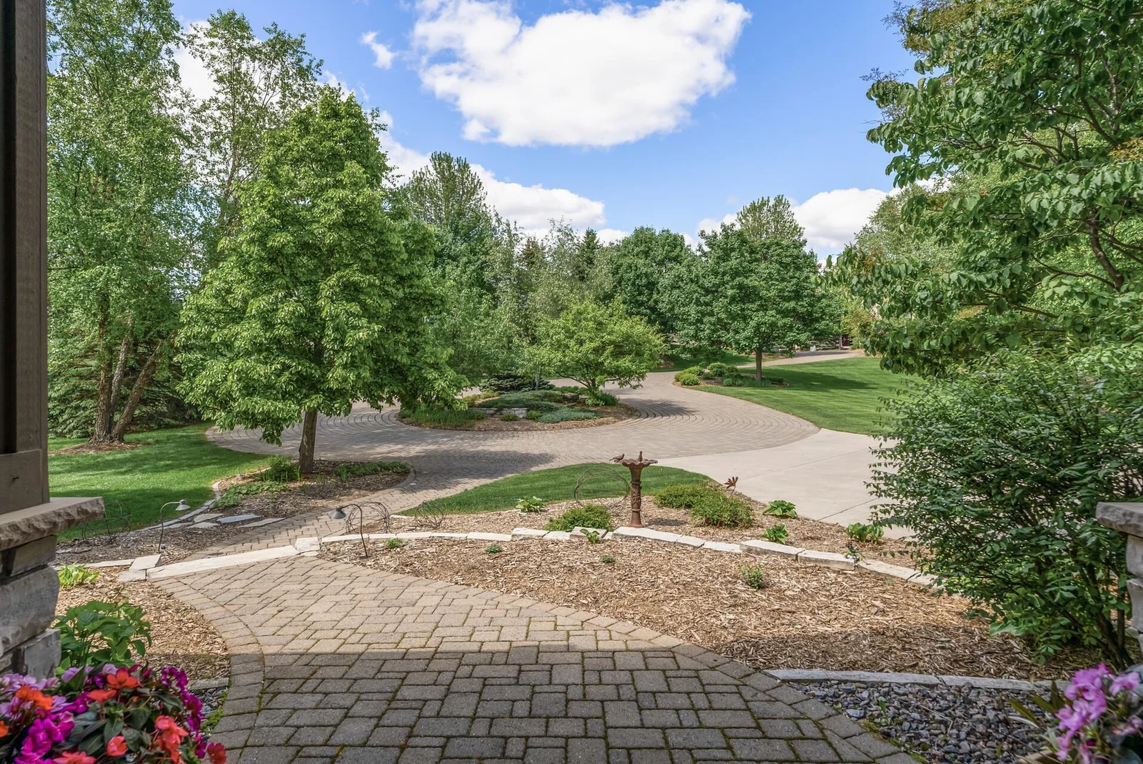 Home sits secluded off the road, yet easy access to walking trails, shopping and major roads for commuting