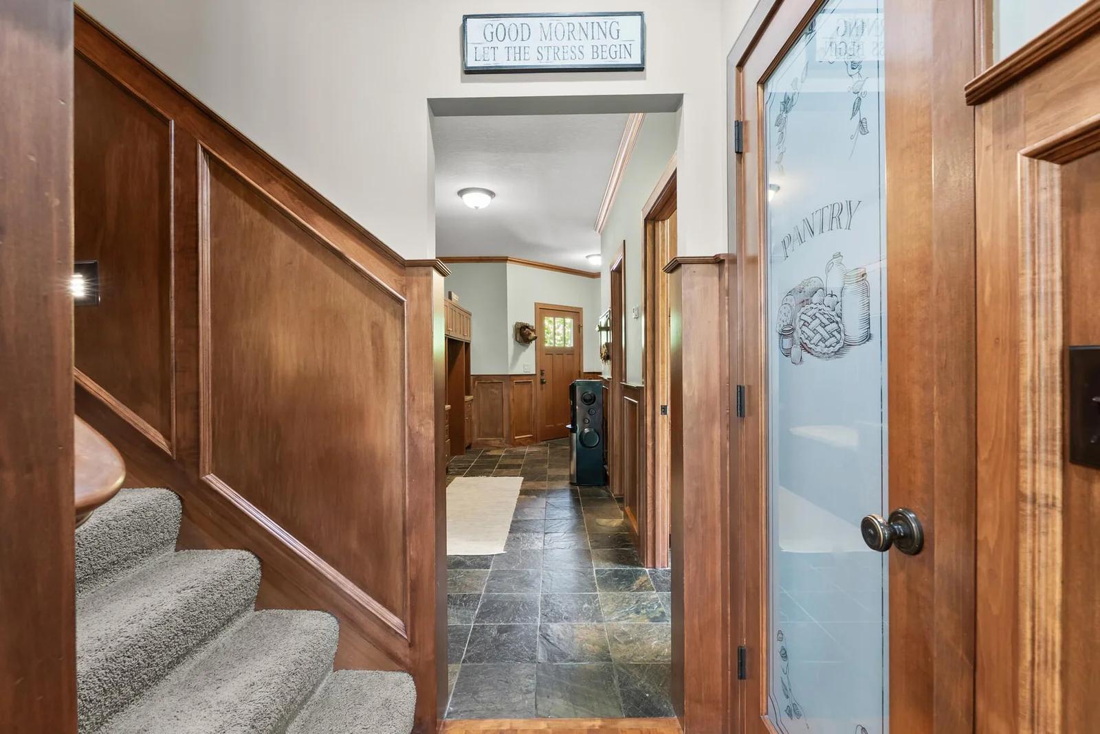 2nd staircase that leads from upstairs wing leads next to kitchen.  View of the mudroom