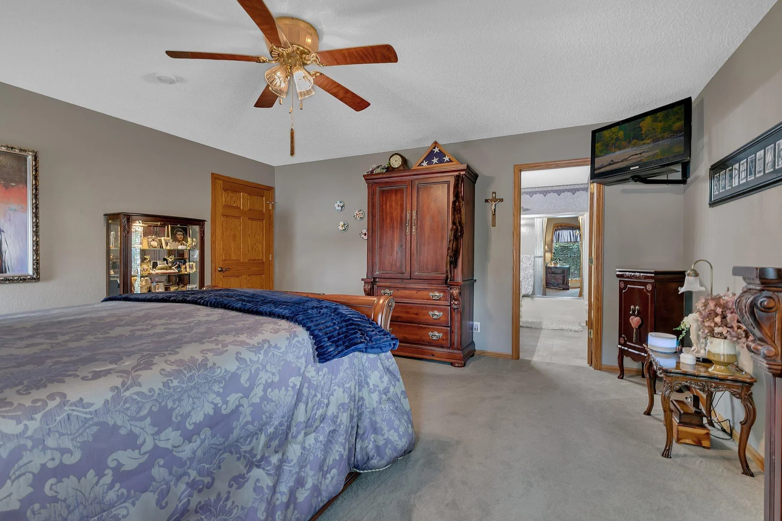 Primary bedroom showing the private ensuite. Imagine waking up to wonderful lake views every morning!