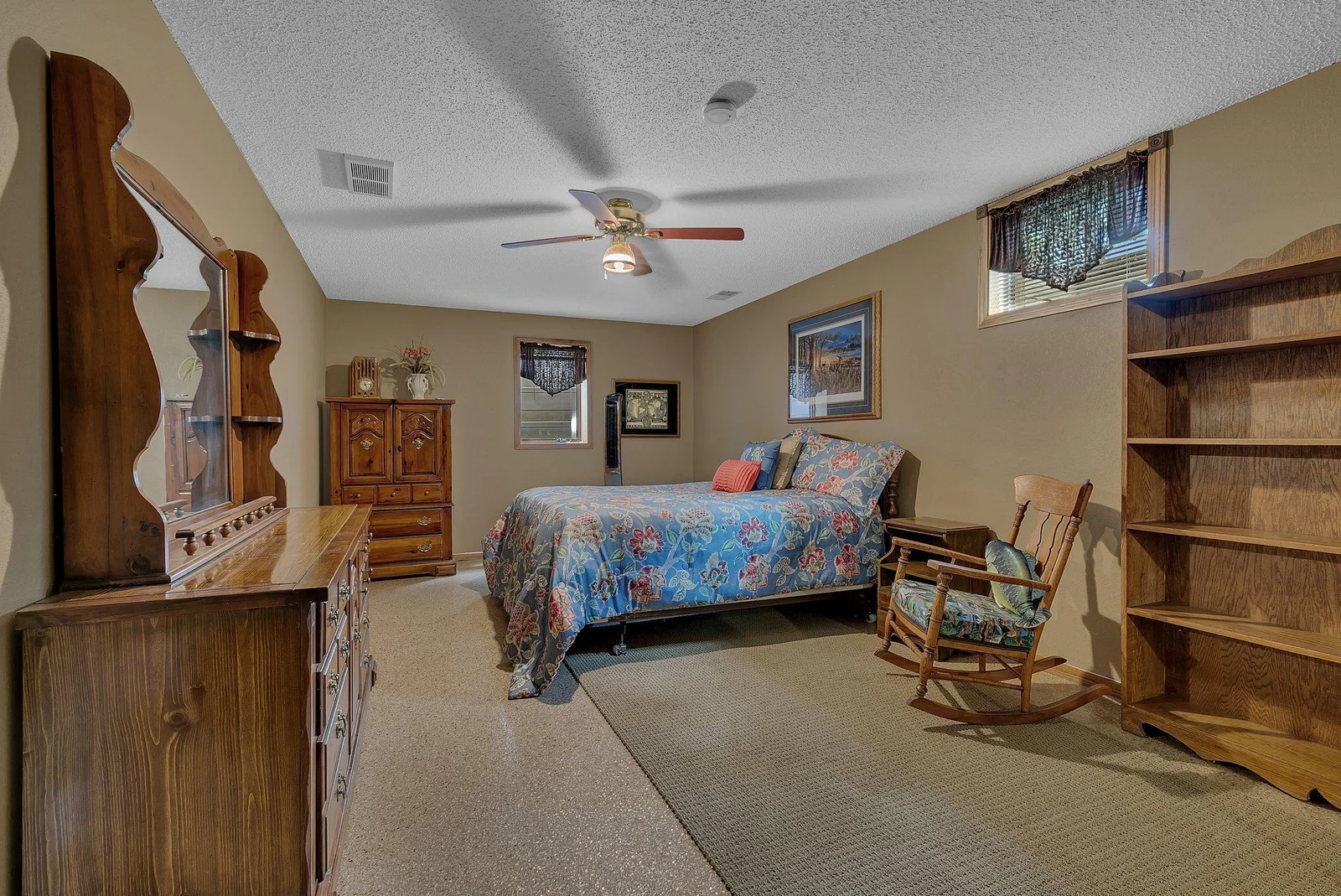 Lower level 3rd bedroom with large closet and epoxy floor. This would make for a great guest room for those long lake weekends.