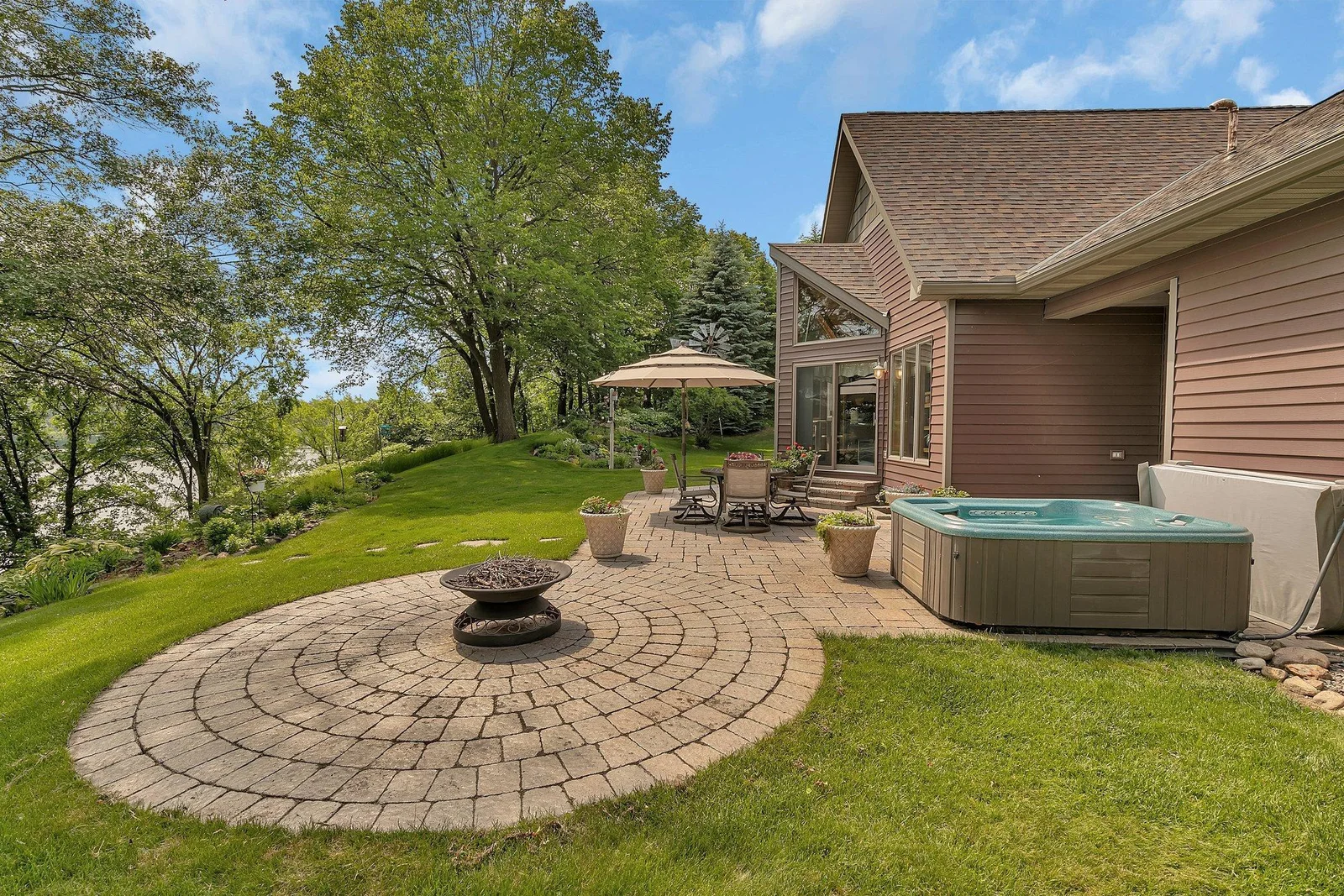 Enjoy cooler evenings or winter nights with some of the best views from the fire area or Hot Springs Spa.  This home has amazing landscaping throughout and is move-in ready!