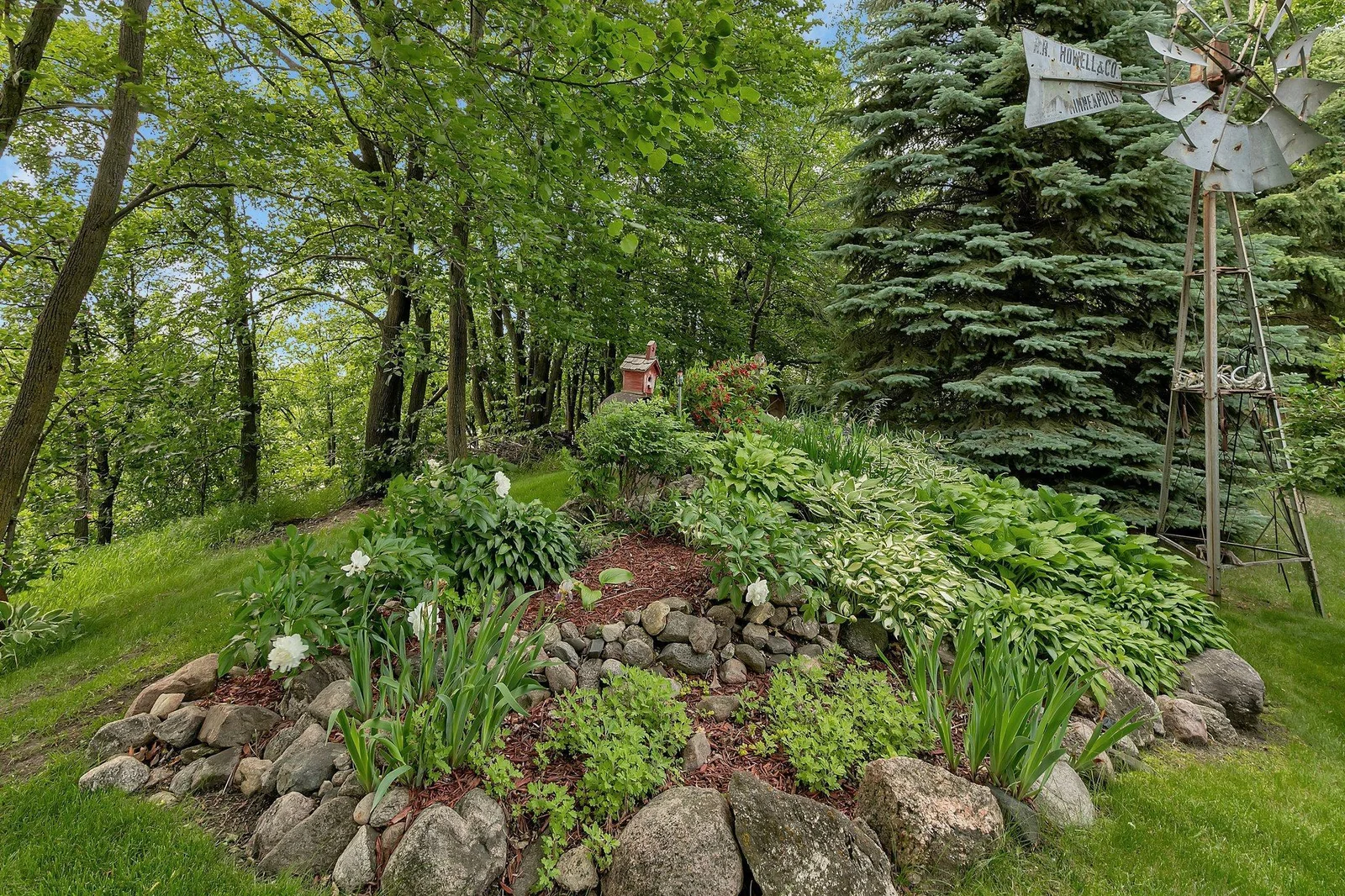 Mature perennial gardens throughout the property attract wildlife of all kinds. The landscaping is easy to maintain throughout the property.