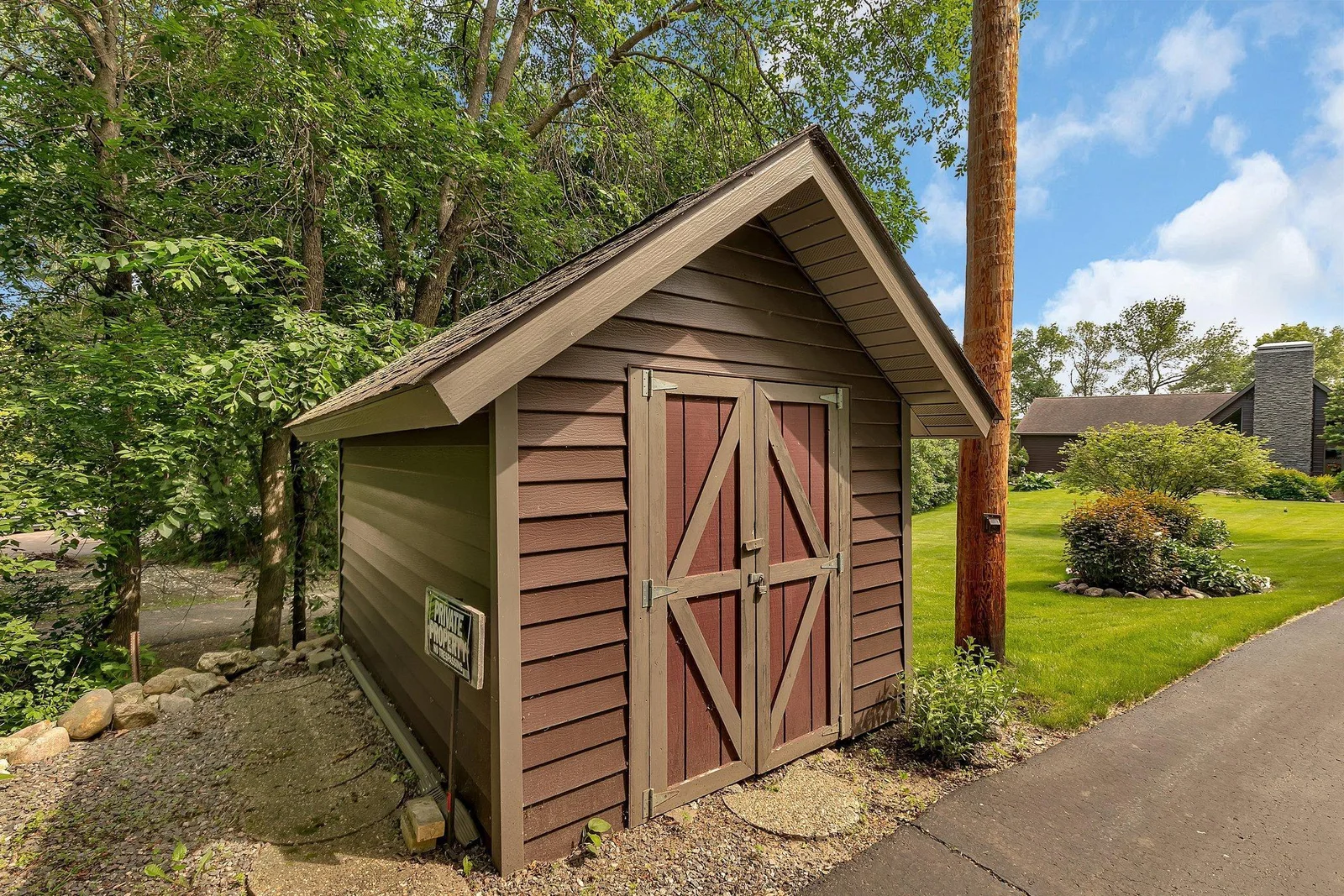 With all the gardens comes a garden shed. Great for storage of garden tools or season items during the winter.