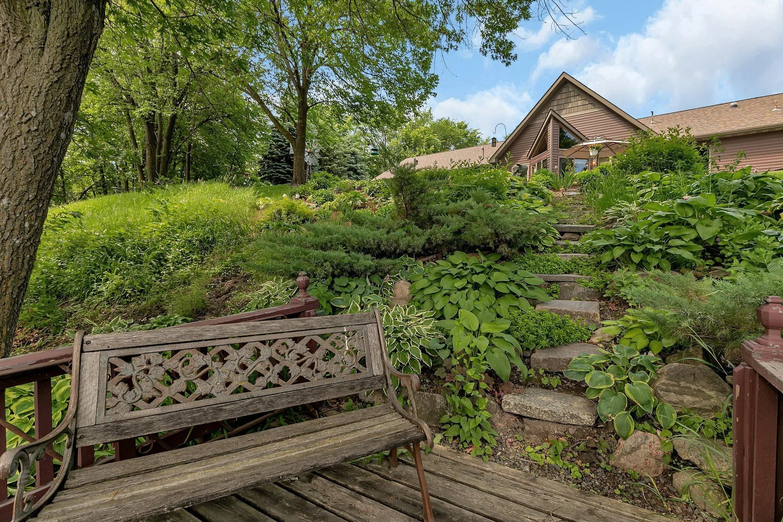 Sit, relax, and enjoy your surroundings. This home is simply amazing with all the perennial gardens and features it has to offer.