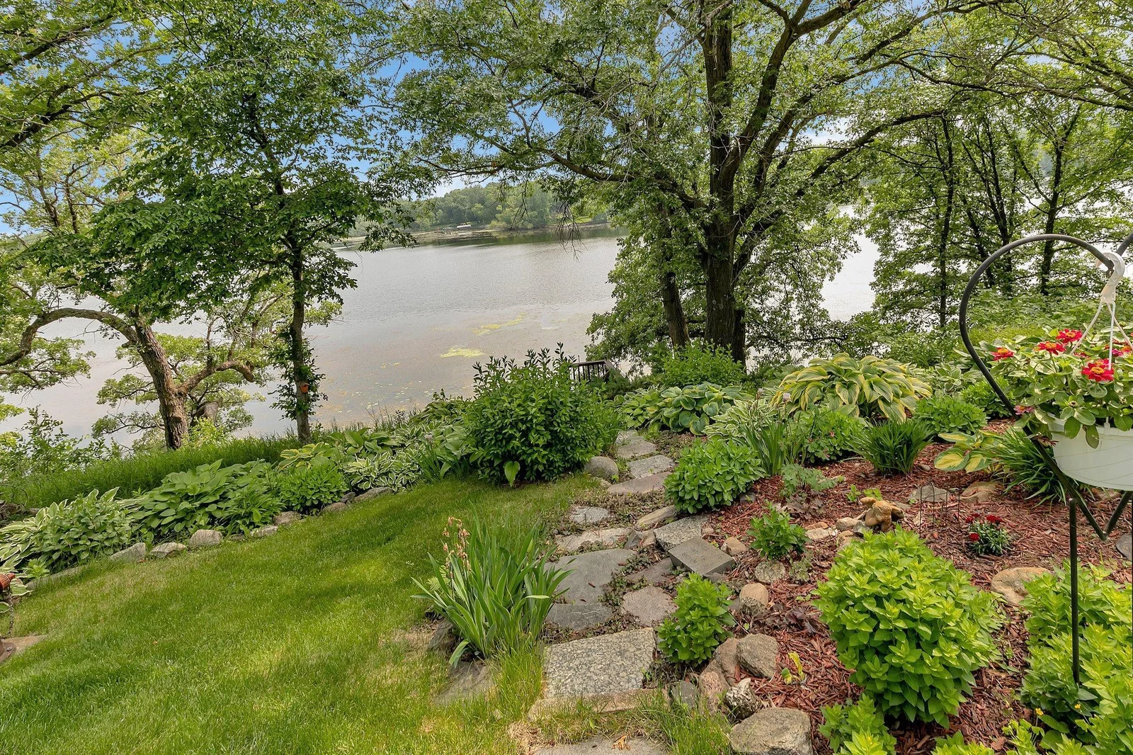 Have you ever seen a more manicured yard? This yard is amazing and so easy to car for. It also keeps the hill from eroding.