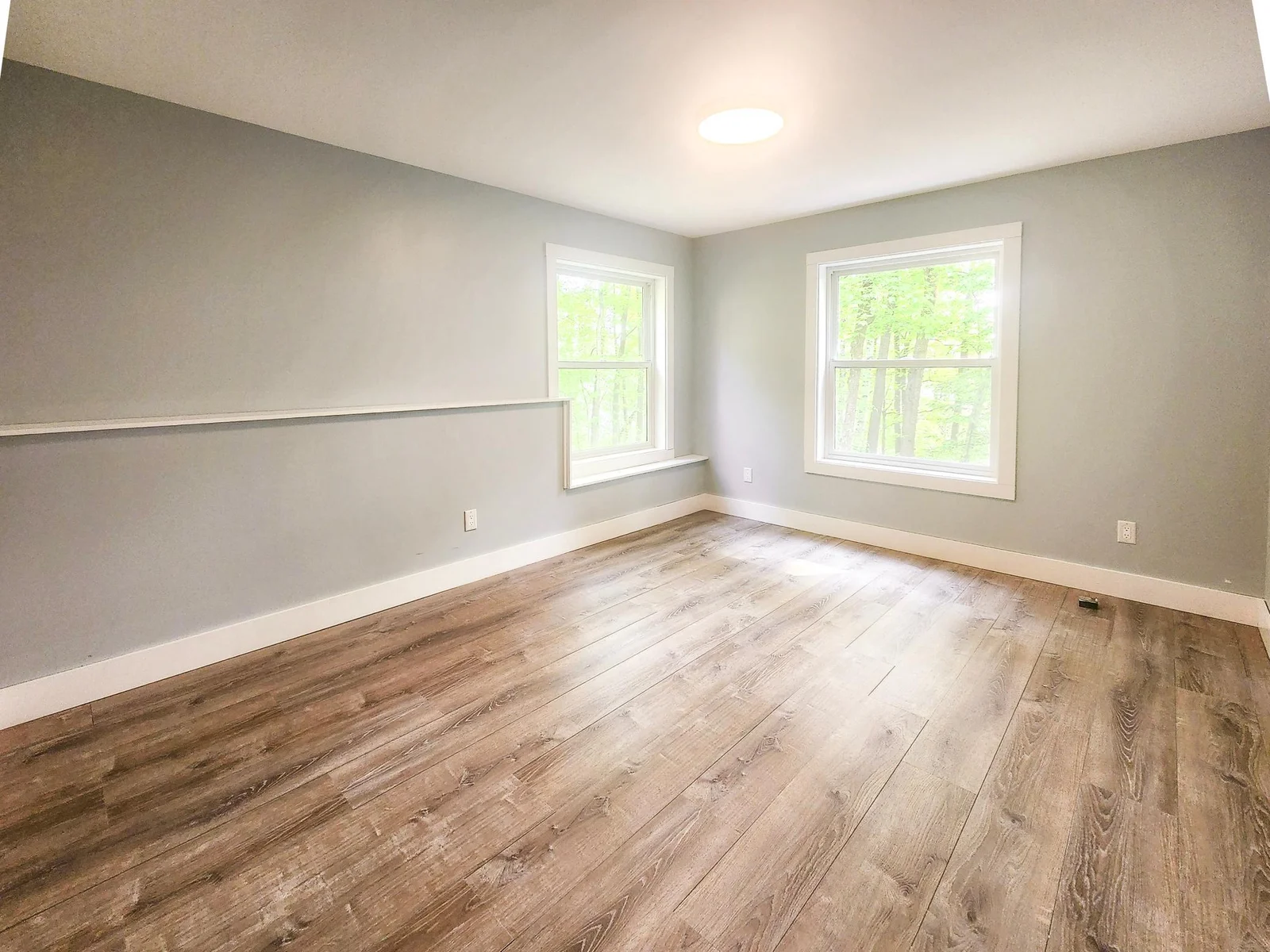 Bonus room in lower level, large space to be used as you desire...over flow sleeping space, office, studio, exercise room, possibilities galore!