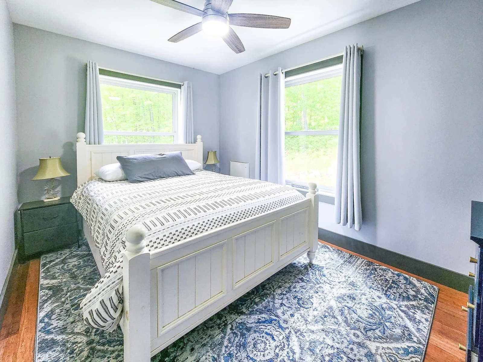 Mainfloor bedroom, windows allow so much natural light in, wonderful and welcoming