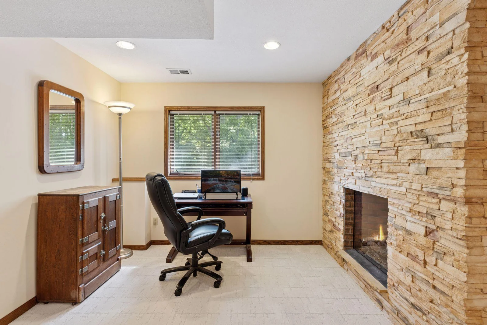 Family Room with gas fireplace and stone hearth
