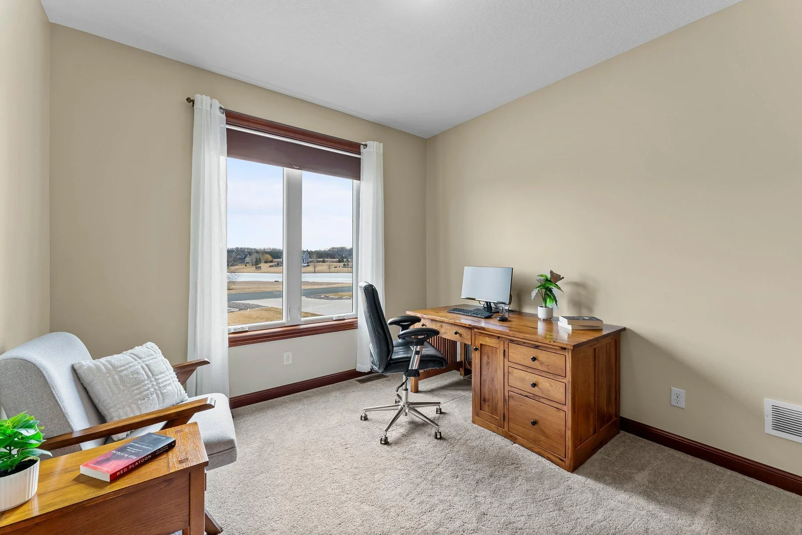 Two additional well-sized bedrooms are also located on the main floor.