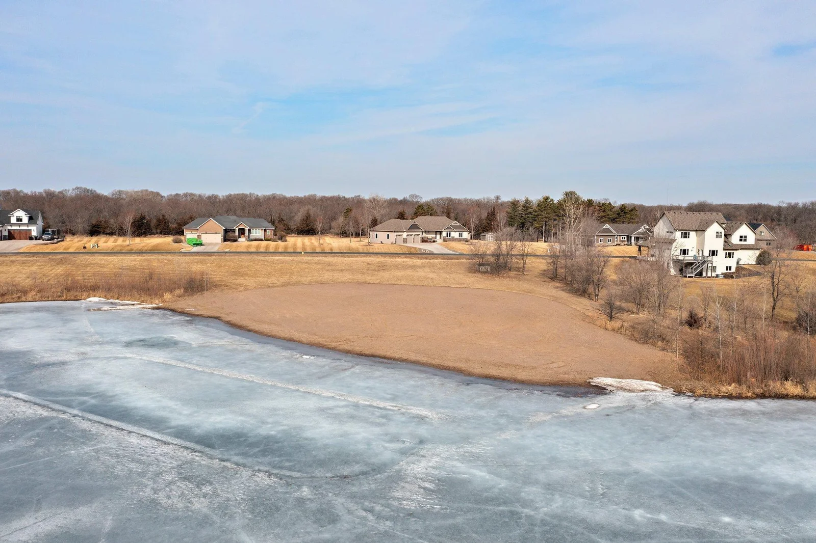 A private swimming pond and beach are just across the street.
