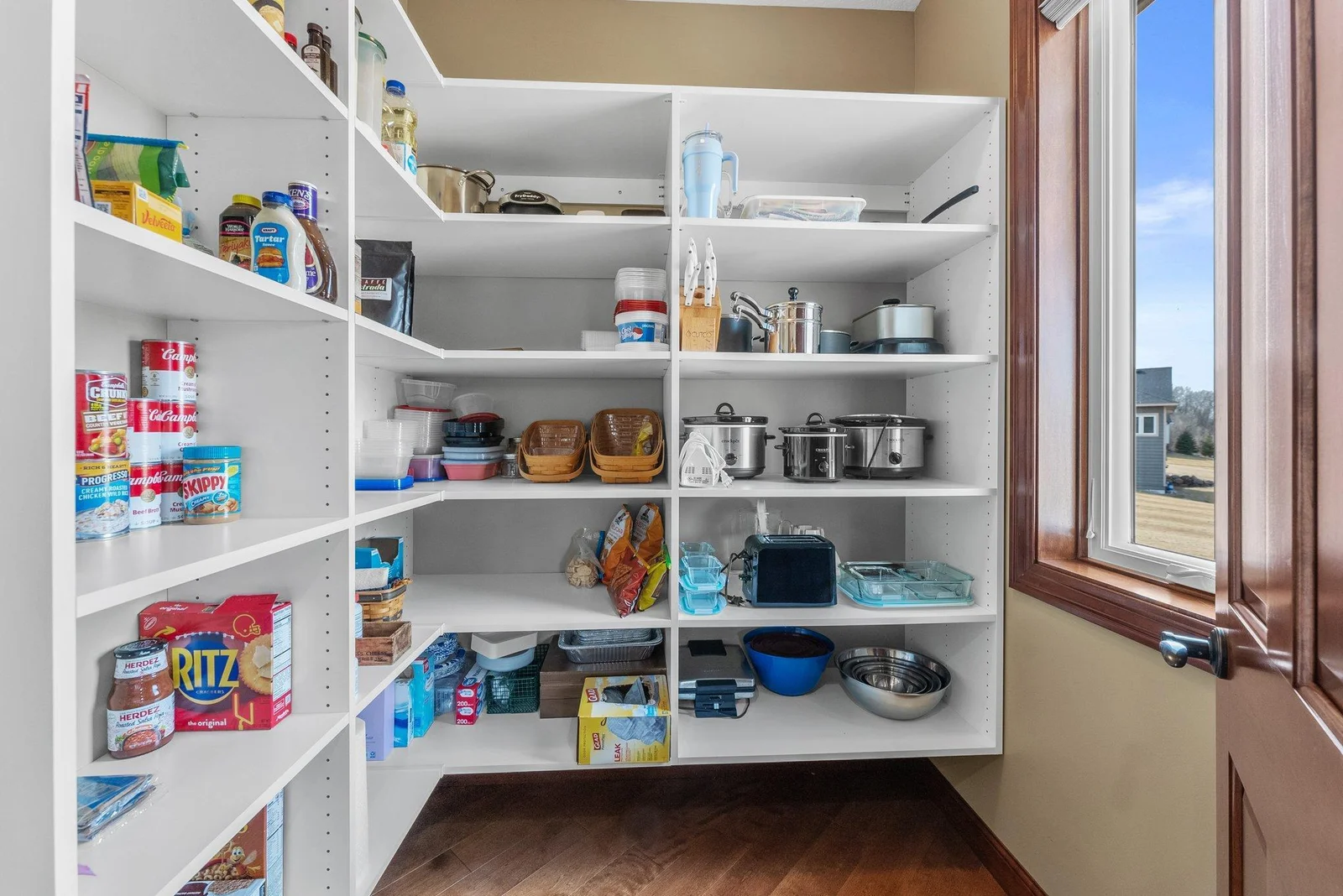 A spacious pantry ensures you have ample storage for all your culinary needs.