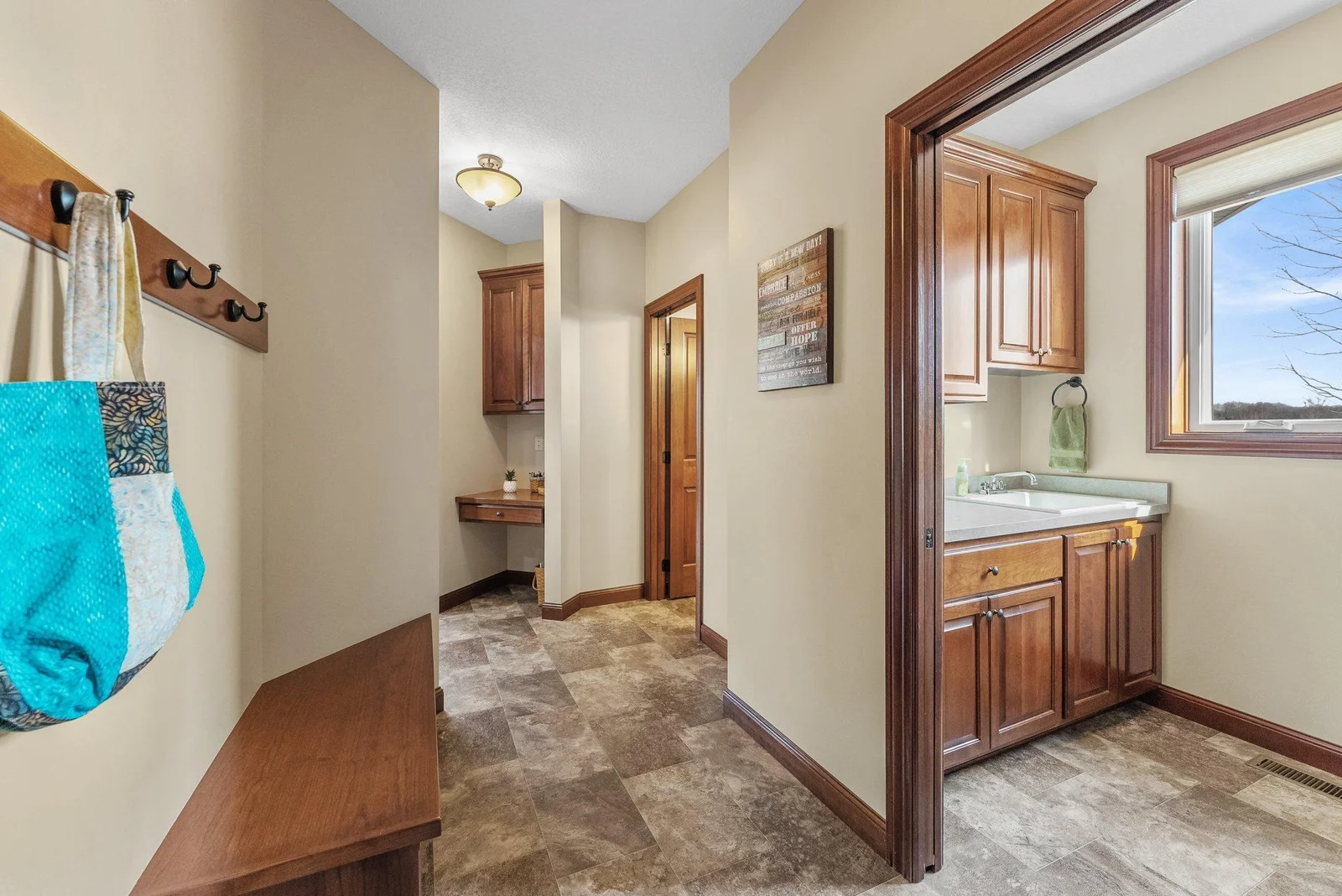 Practicality is never compromised in this home, as evidenced by the main level mudroom, located just off the garage. The convenience of this mudroom makes everyday life that much easier.