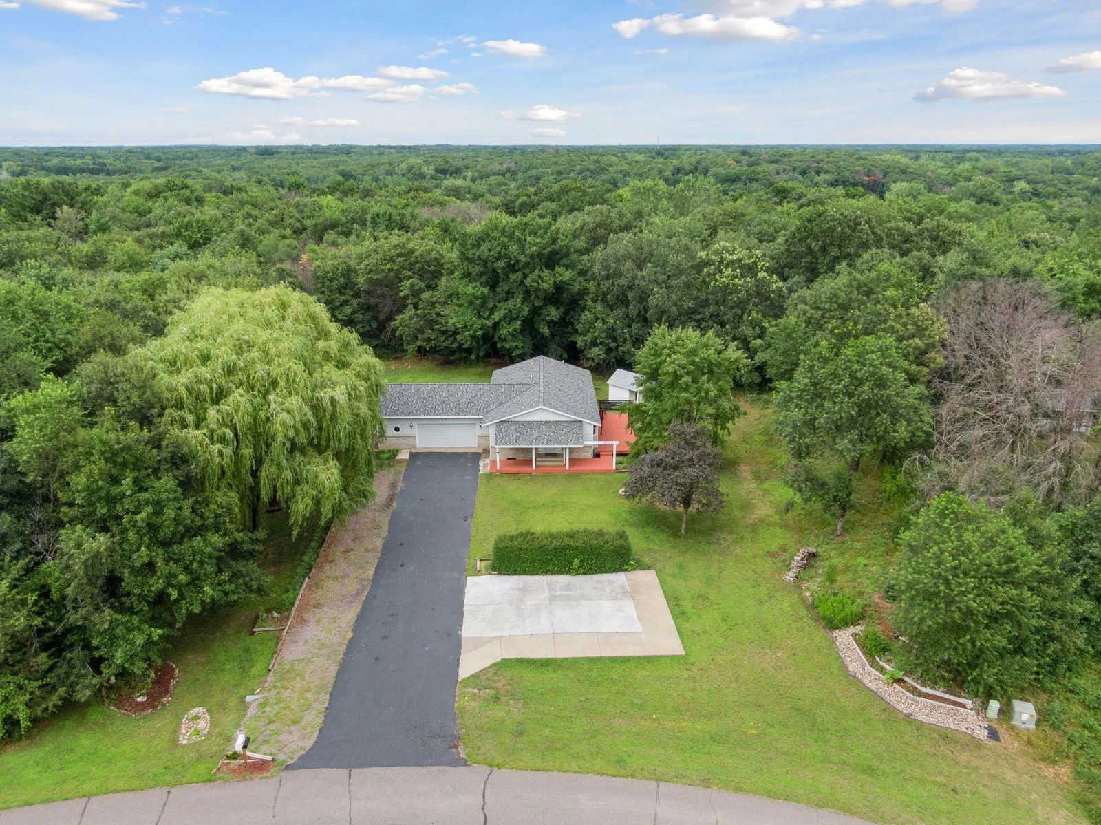 Welcome to 16760 203rd Ave NW. Great Cement Pad at 36' x 30'
