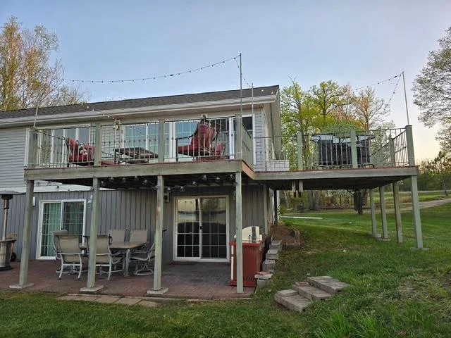 Large upper level deck and tuck under patio