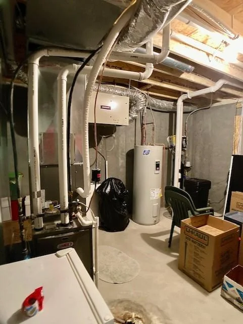 Mechanical storage room with abundant storage space Radon mitigation system.jpg