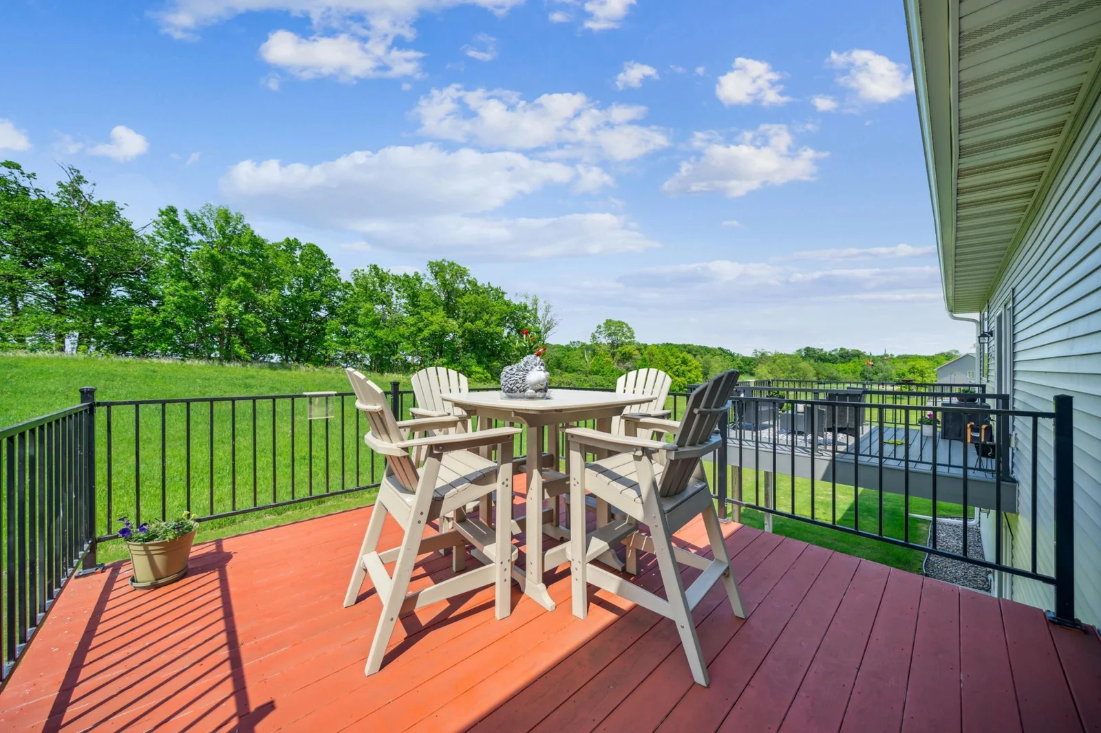 Deck with rear yard vista views perfect for relaxation and entertaining.jpg