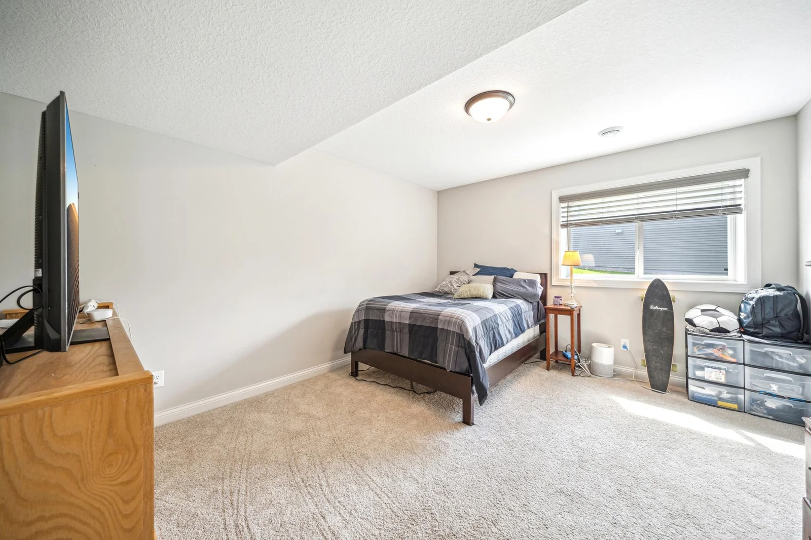 Lower level fourth bedroom with generous closet space.jpg