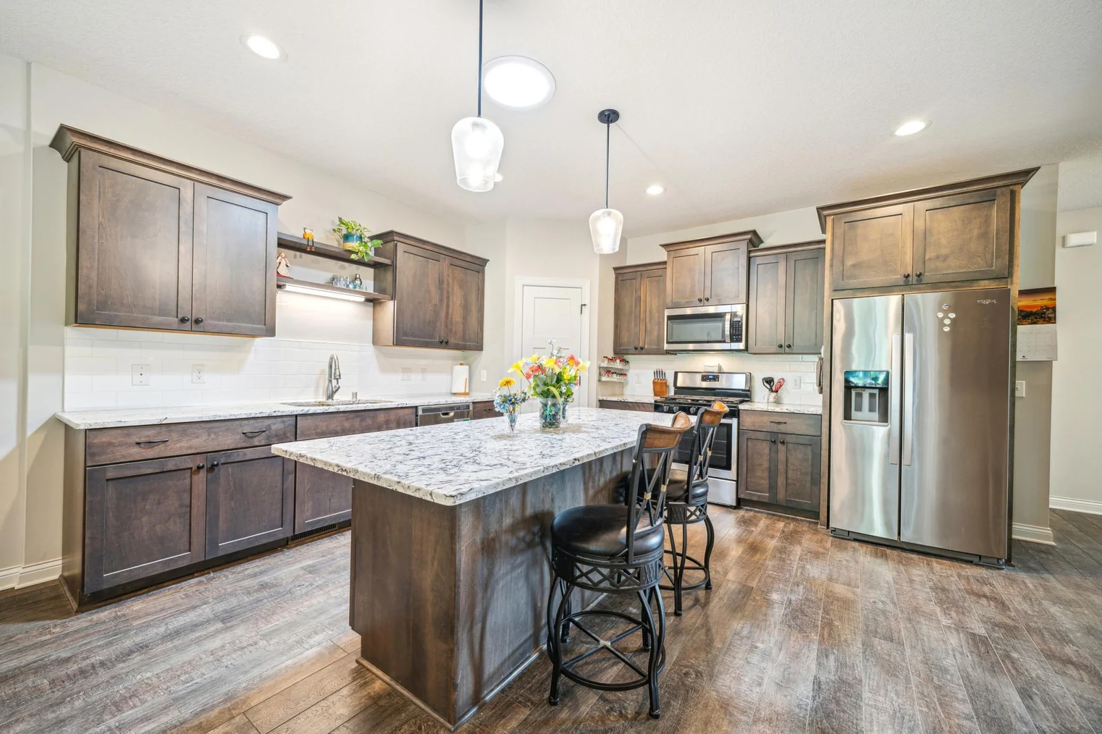 Fabulous kitchen custom slow close pull out drawer cabinetry large center island Stainless Steel Appliances Walkin Pantry.jpg
