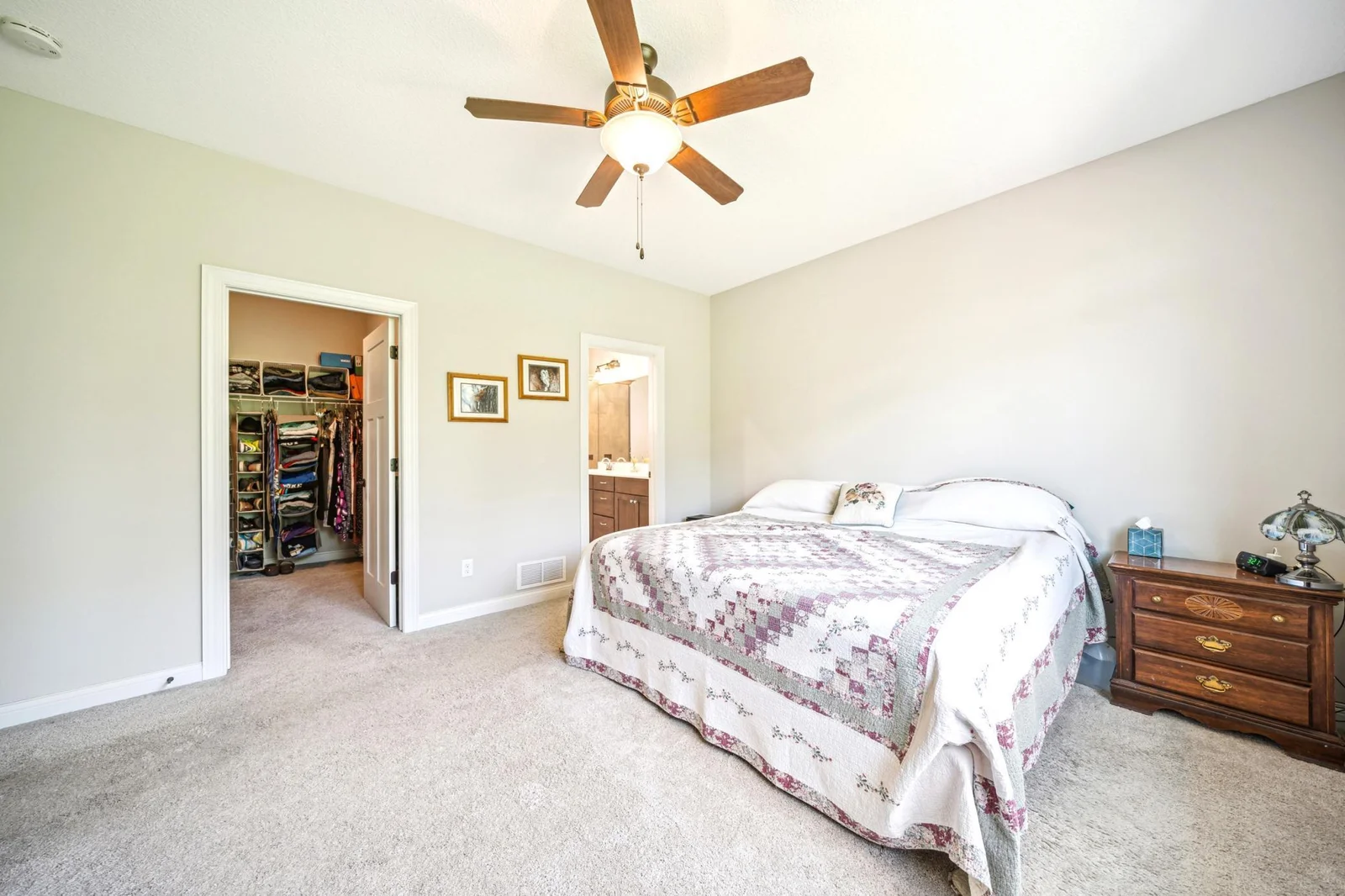 Spacious Primary bedroom with ensuite bath and large walkin closet.jpg