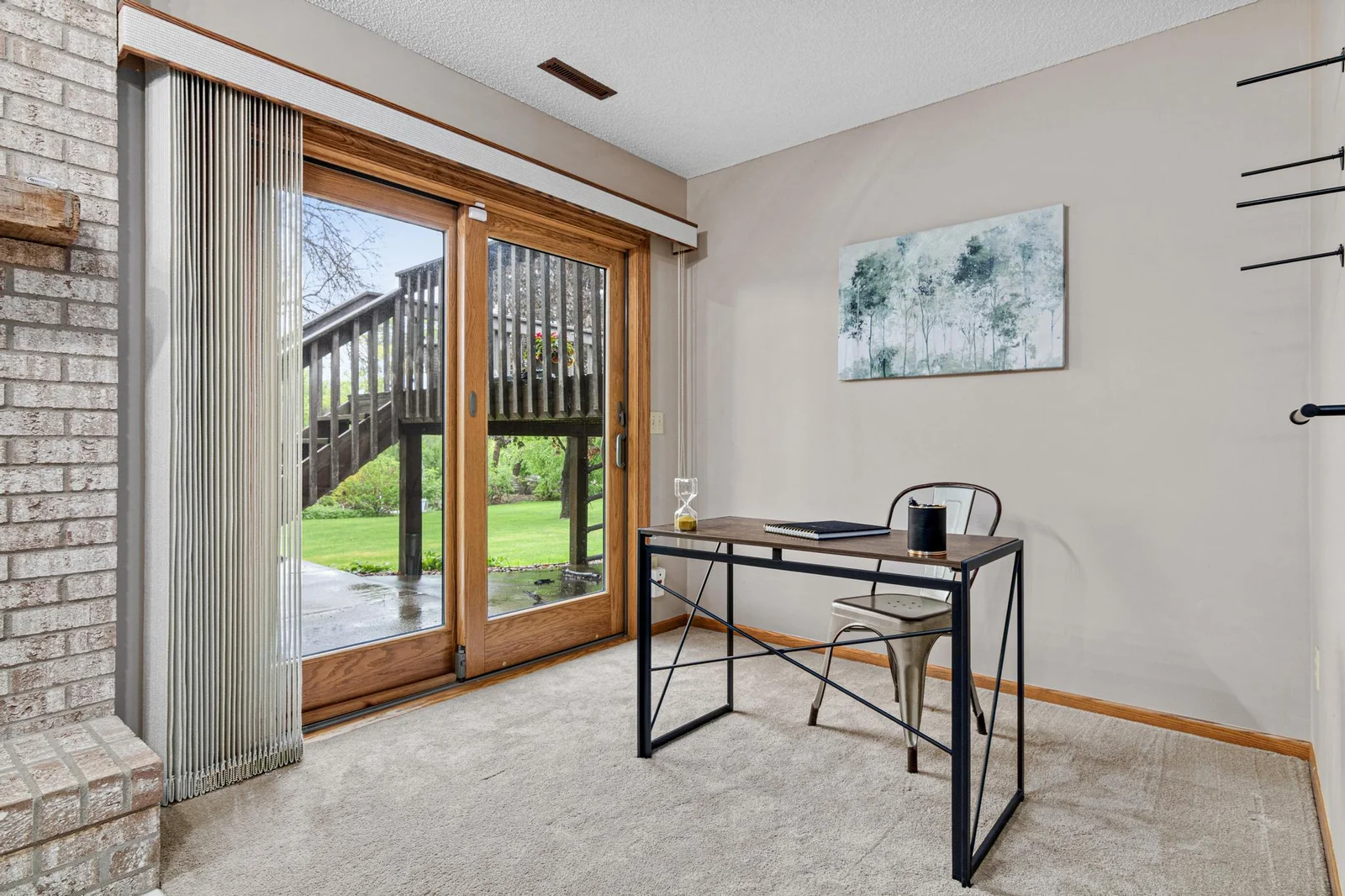 Plenty of space by the sliding glass door to have an office space or dry bar